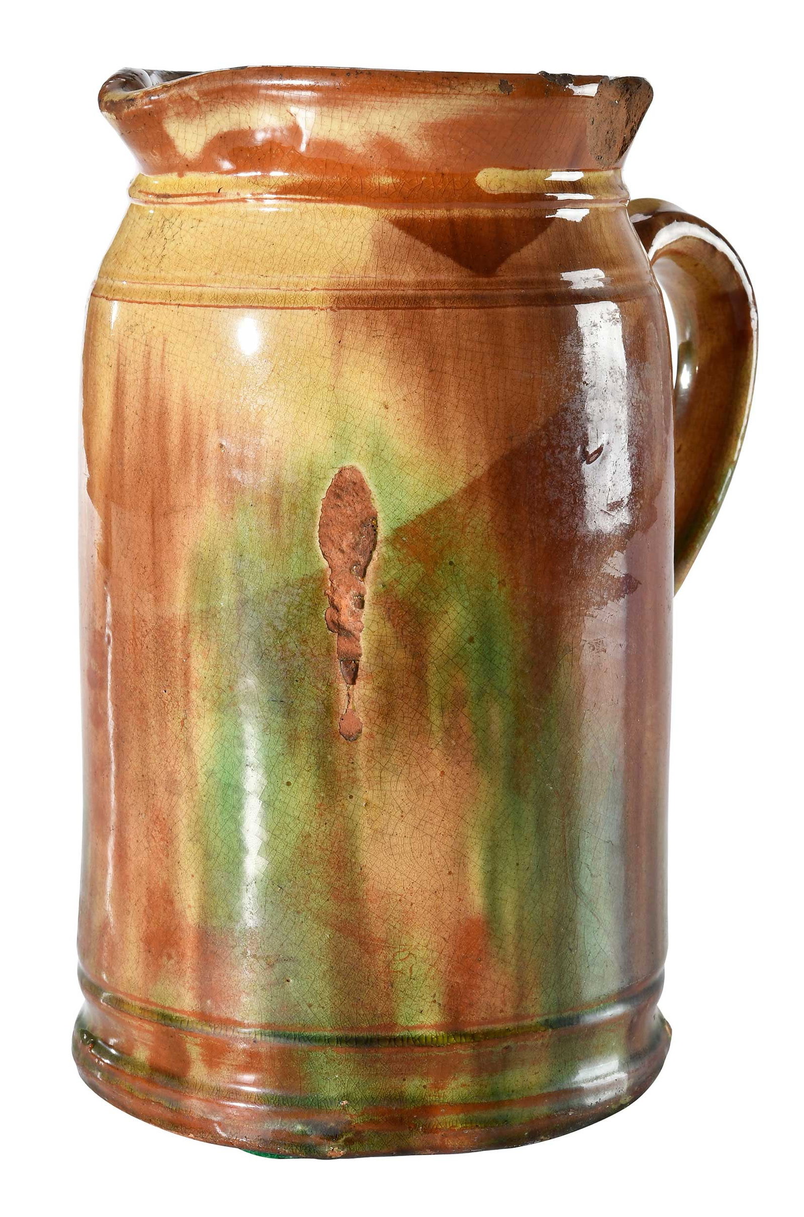 Rare Large J. Eberly & Co. Strasburg, Virginia Attributed Earthenware Pitcher: Shenandoah Valley, circa 1885-1899, lead oxide, manganese, copper, and engobe glaze, cylindrical form with rounded shoulder, tooled footed base with impressed lower edge, incised band at ridged neck, 