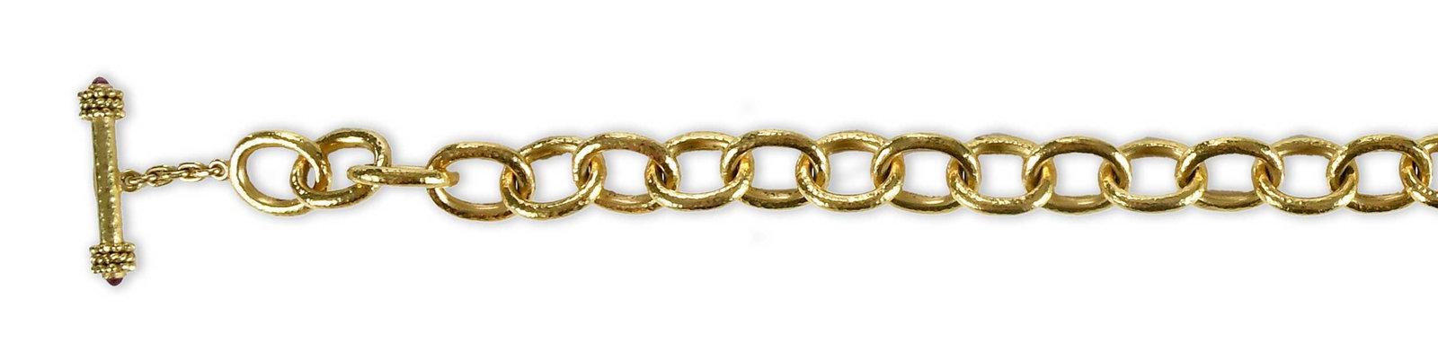 19kt. Elizabeth Locke Montecatini Link Necklace: oval links, toggle closure, two round ruby cabochons, marked "19k", yellow gold, maker's mark, 17 in. length, hammered finish, 15.0mm width links, 99.7 g Provenance: Collection of Dr. George and Conni