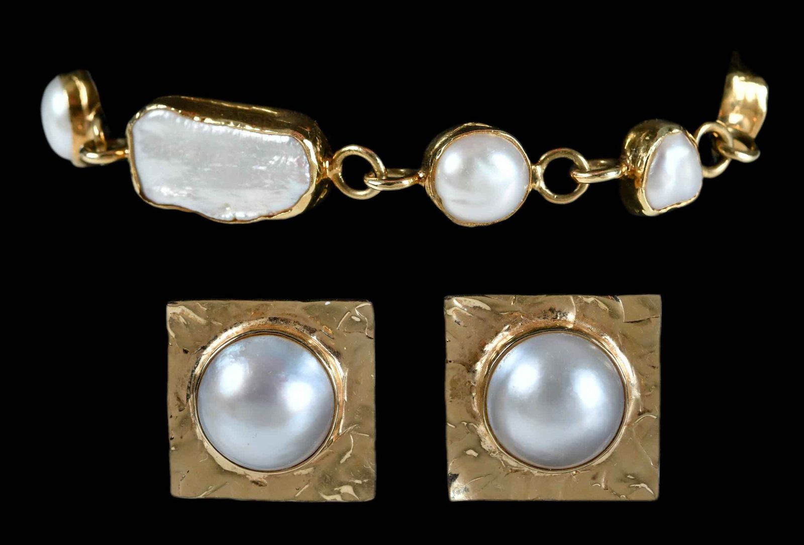 14kt. Mabe Pearl Earrings and Pearl Bracelet: two mabe pearls, approx. 16.0mm, marked "14k", yellow gold, 1 x 1 in., post backs, 17.2 g; eight pearls, tests 14kt. yellow gold, 7 in. length, 10.0mm at widest area, 30.2 g Provenance: Collection of