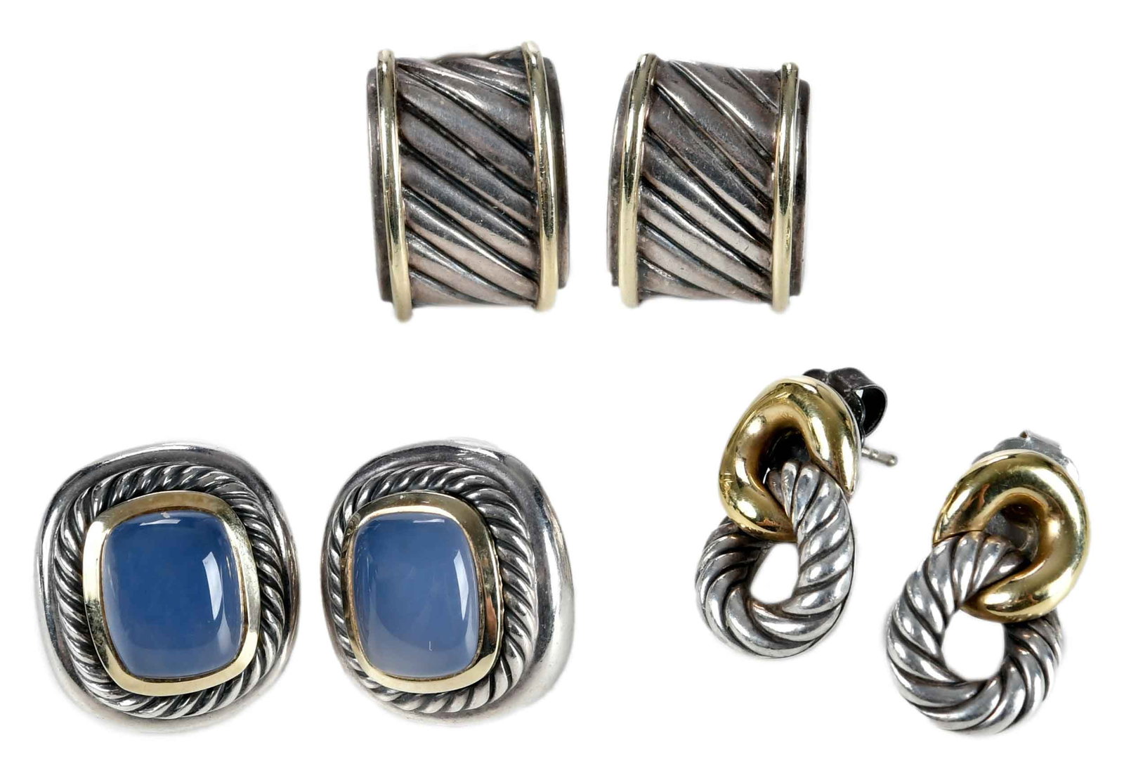 Three Pairs of David Yurman Earrings Silver with Gold Accents: cabochon cut chalcedony, approx. 12.0 x 10.0mm, marked "DY, 925, 585", 14kt. yellow gold, omega post backs, 20.0 g; half round, marked "DY, 925, 585", 14kt. yellow gold, omega post backs, approx.