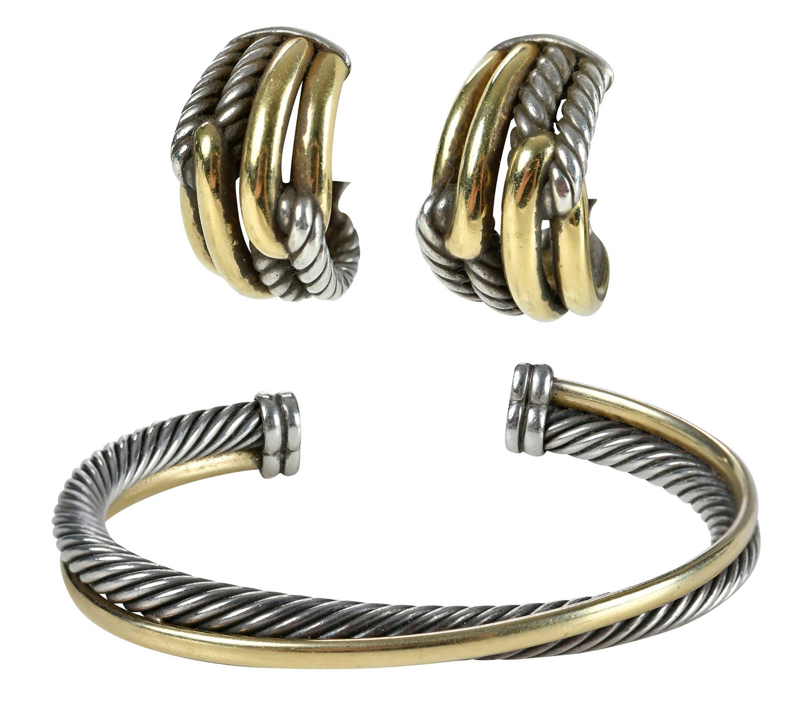 18kt. and Sterling David Yurman Bracelet and Earrings: cuff bracelet, Cross Over Collection, marked "750, DY, 925, 1/4", yellow gold, approx. 6 in. inside measurement, 38.0 g; Cable Loop Hoop Collection, marked "750, DY, 925," yellow gold, 3/4 in. length,