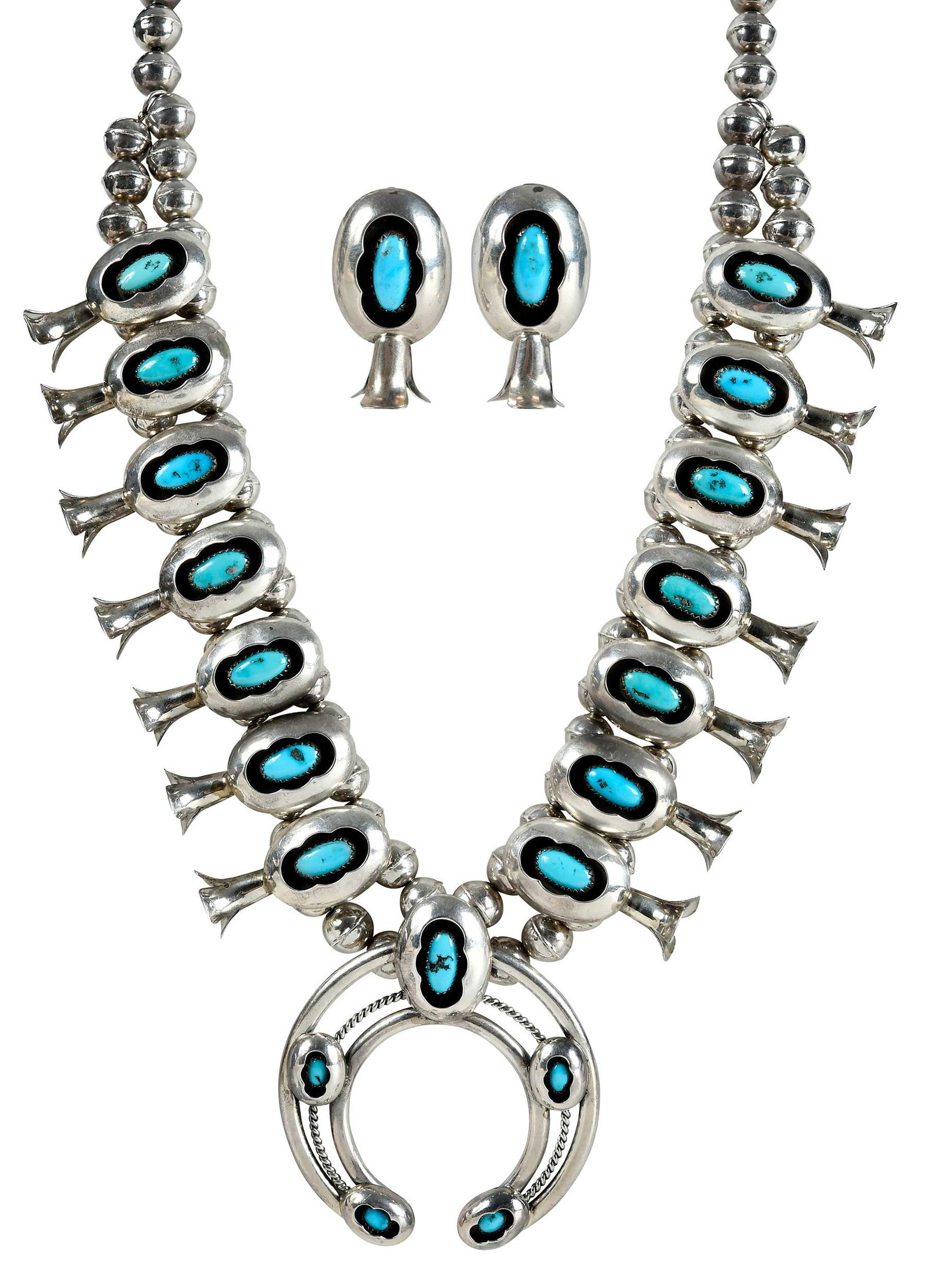 Silver Turquoise Squash Blossom Necklace and Matching Earrings: sterling silver, oval turquoise cabochons in a naja pendant, 15 oval flower turquoise cabochon squash blossoms, marked "PG, Sterling", Phil Garcia, hook and eye closure, 25 in. length; two oval turquo