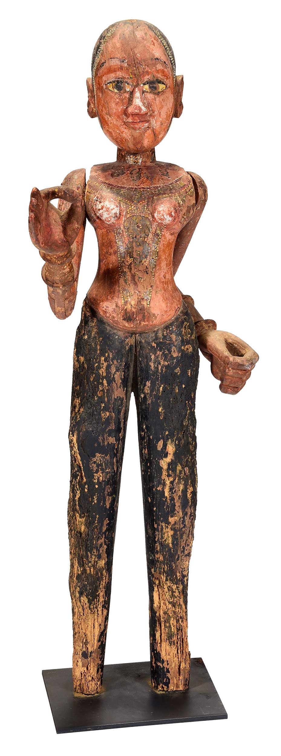 Indian Carved and Articulating Gangaur Festival Figure: late 19th/20th century, probably depicting Parvati as Gauri, hinged/articulating arms, carved wood construction with old painted surface, mounted on metal stand, 31-1/2 x 8 x 6 in. including stand Pro