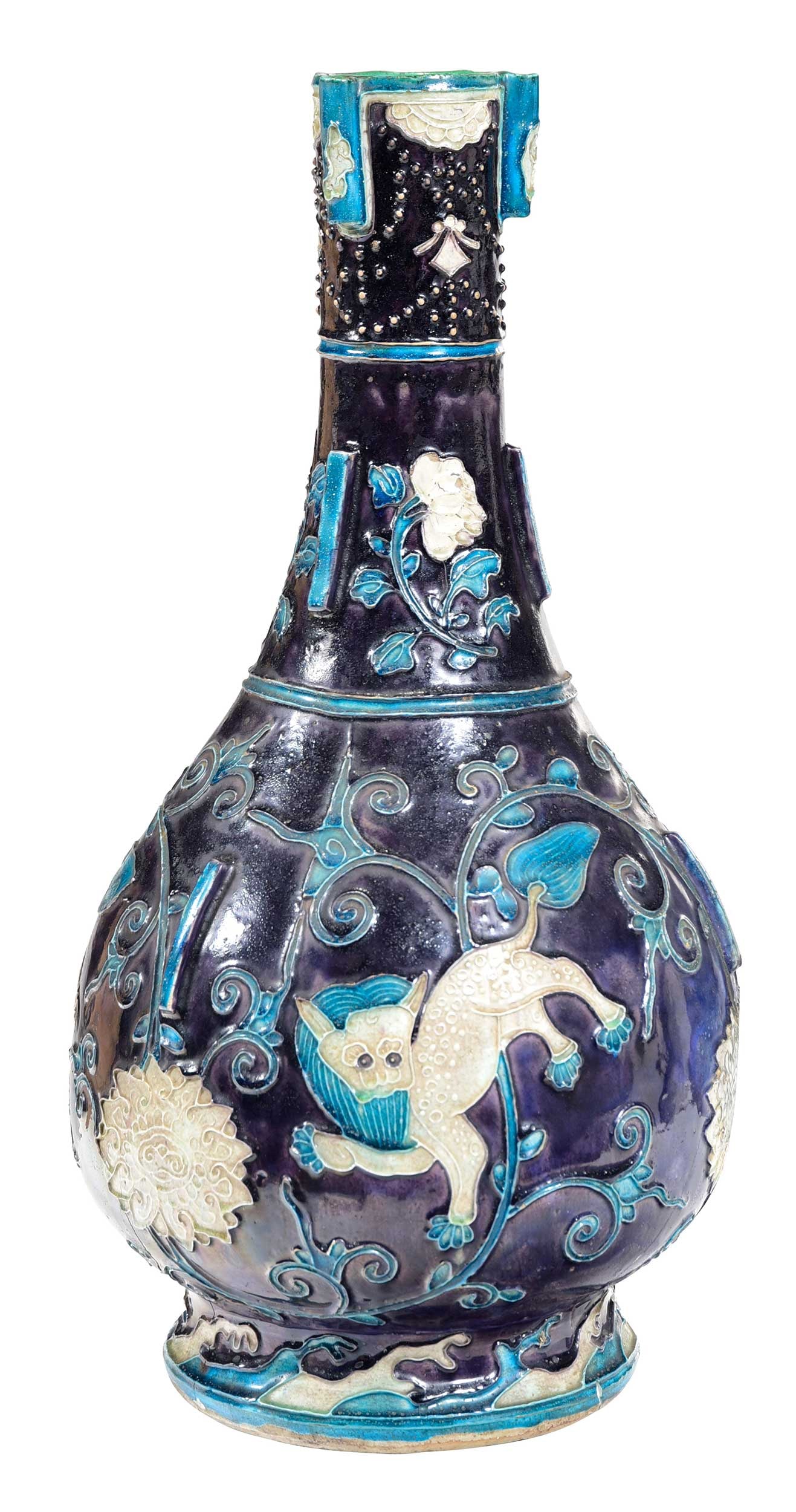 Chinese Pottery Fahua Type Flanged Bottle Vase with Mythical Creatures: early 20th century, purple glazed ground with turquoise and white, raised decoration with horse and mythical creatures to sides, 20 x 9-1/4 x 9-/1/4 in. Provenance: The Collection of William S. Arnett