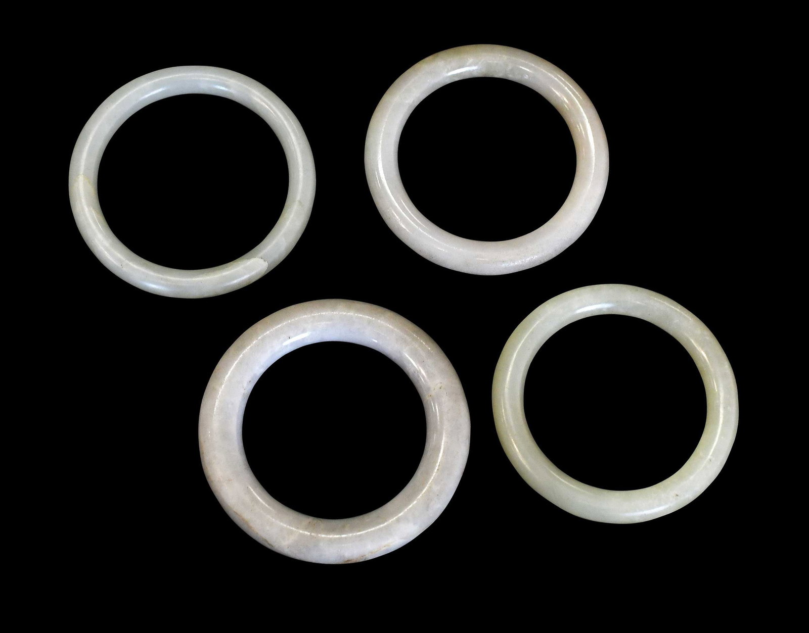 Four Chinese Carved Jade Bangle Bracelets (1 of 2)