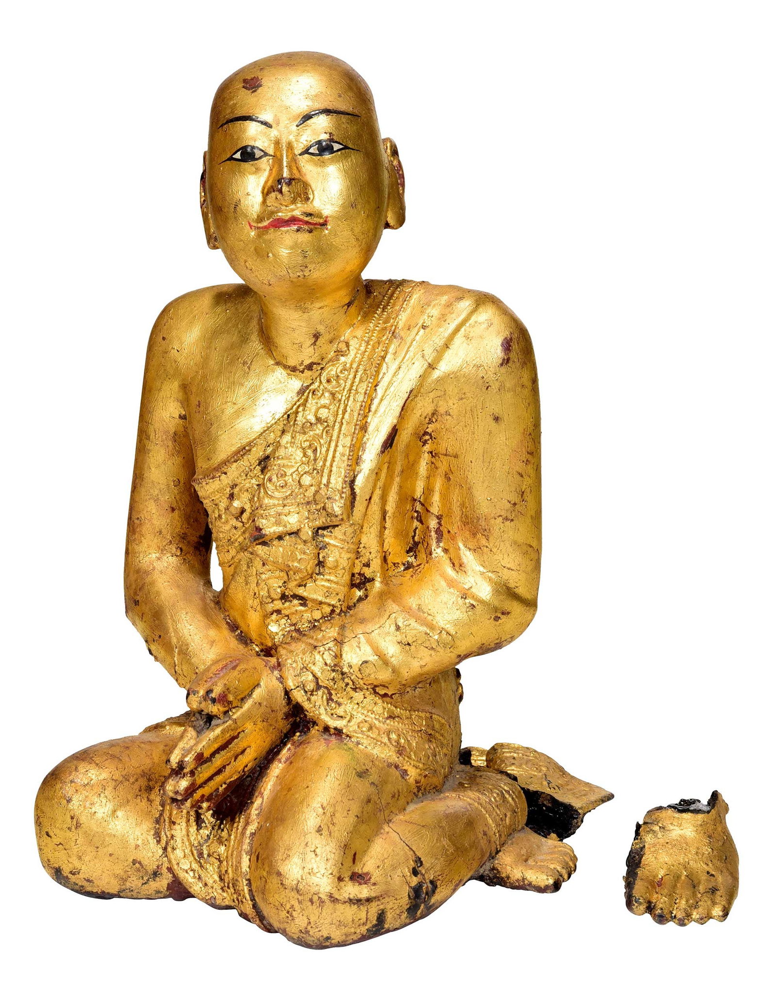 Burmese Mandalay Period/Style Giltwood Kneeling Monk Figure: late 19th century, with expressive painted features, figure kneeling with hands together in anjali mudra, approximately 12 x 7 x 8 in. Provenance: The Collection of William S. Arnett, Atlanta,