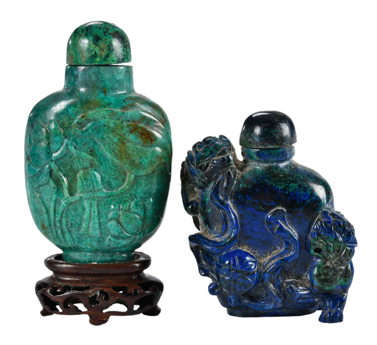 Two Chinese Carved Chrysocolla and Azurite Snuff Bottles: each of flask form with carved figural decoration, matching stone cap and bone or wood spoon, larger 2-3/4 x 1-5/8 x 3/4 in.; larger with carved wood stand Provenance: Collection of Dr. George and Con
