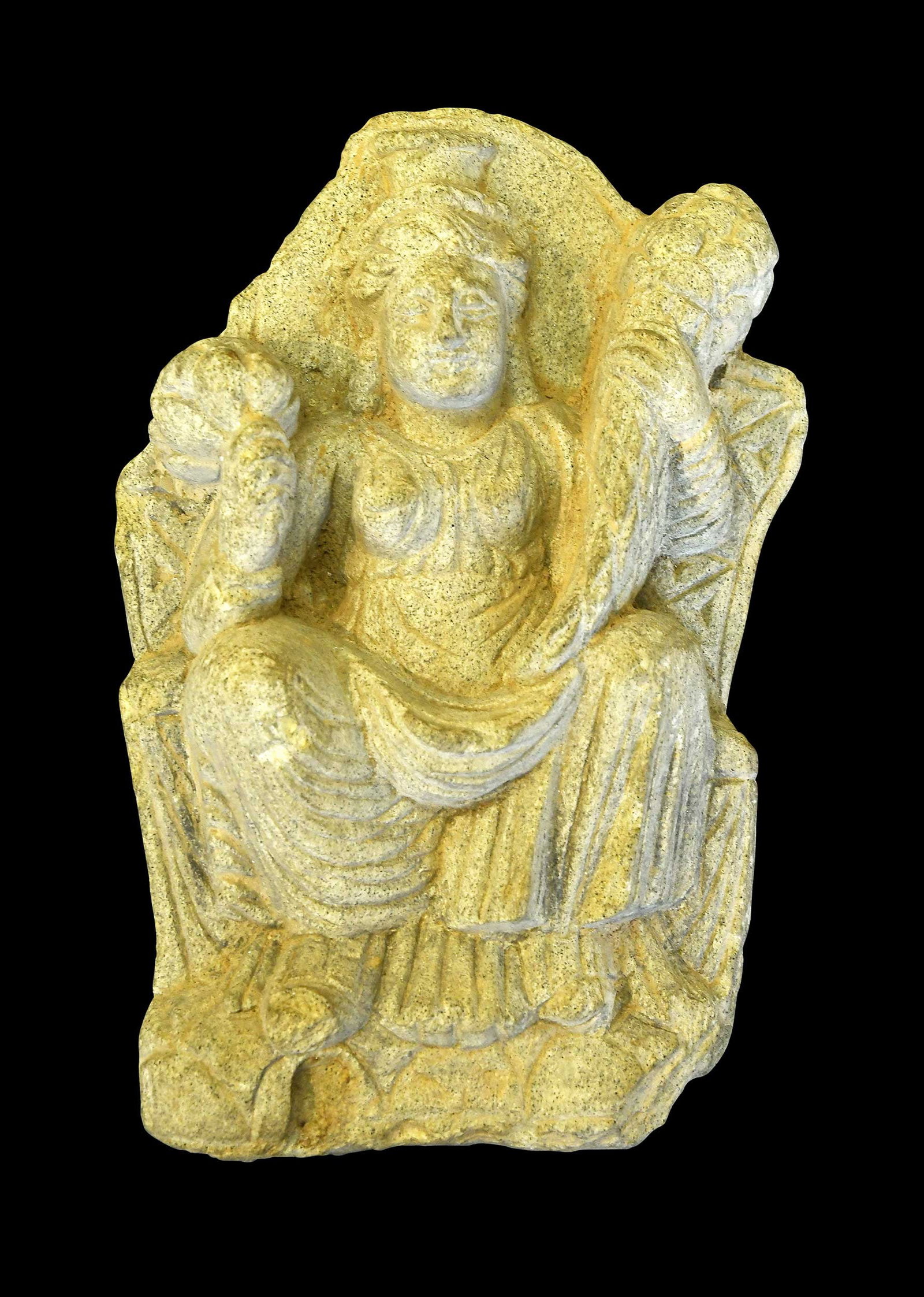Indian Carved Stone Relief of Hariti: age and origin unknown, depicting the goddess Hariti seated with a cornucopia and lotus, 7-3/4 x 5-1/4 x 1-3/4 in. Provenance: From the Collection of Samuel Eilenberg; The Collection of William S.