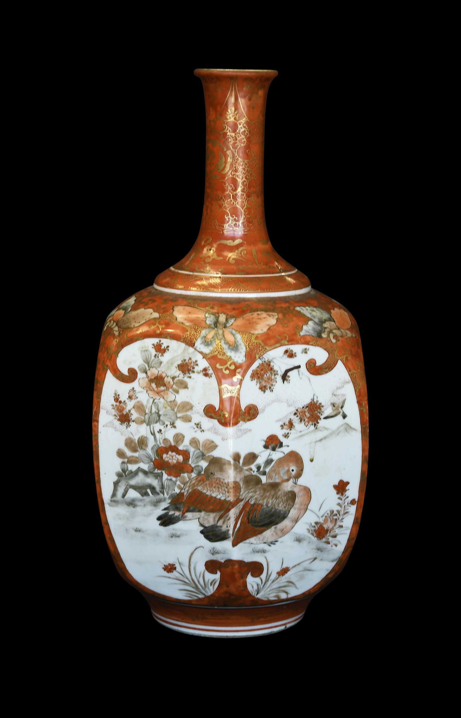 Japanese Meiji Kutani Porcelain Hexagonal Bottle Vase: red and gilt overglazed enameled decoration with butterflies to shoulder, panels to sides with figures and birds, inscription to underside, 12 x 6-1/2 x 5-1/2 in. Provenance: The Collection of