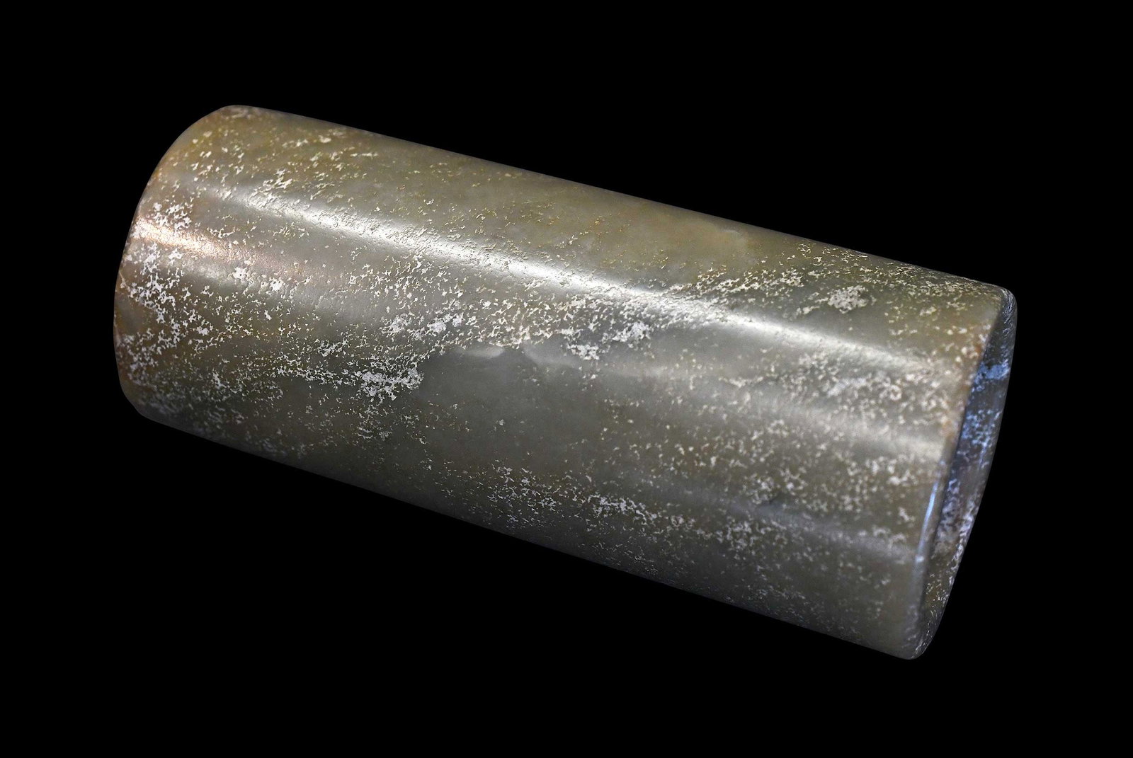 Chinese Carved Jade Tube: green with variegated inclusions, 4-1/8 x 1-3/4 x 1-3/4 in. Provenance: The Collection of William S. Arnett, Atlanta, Georgia; sold to benefit Tinwood Foundation Note: This item tested as nephrite on