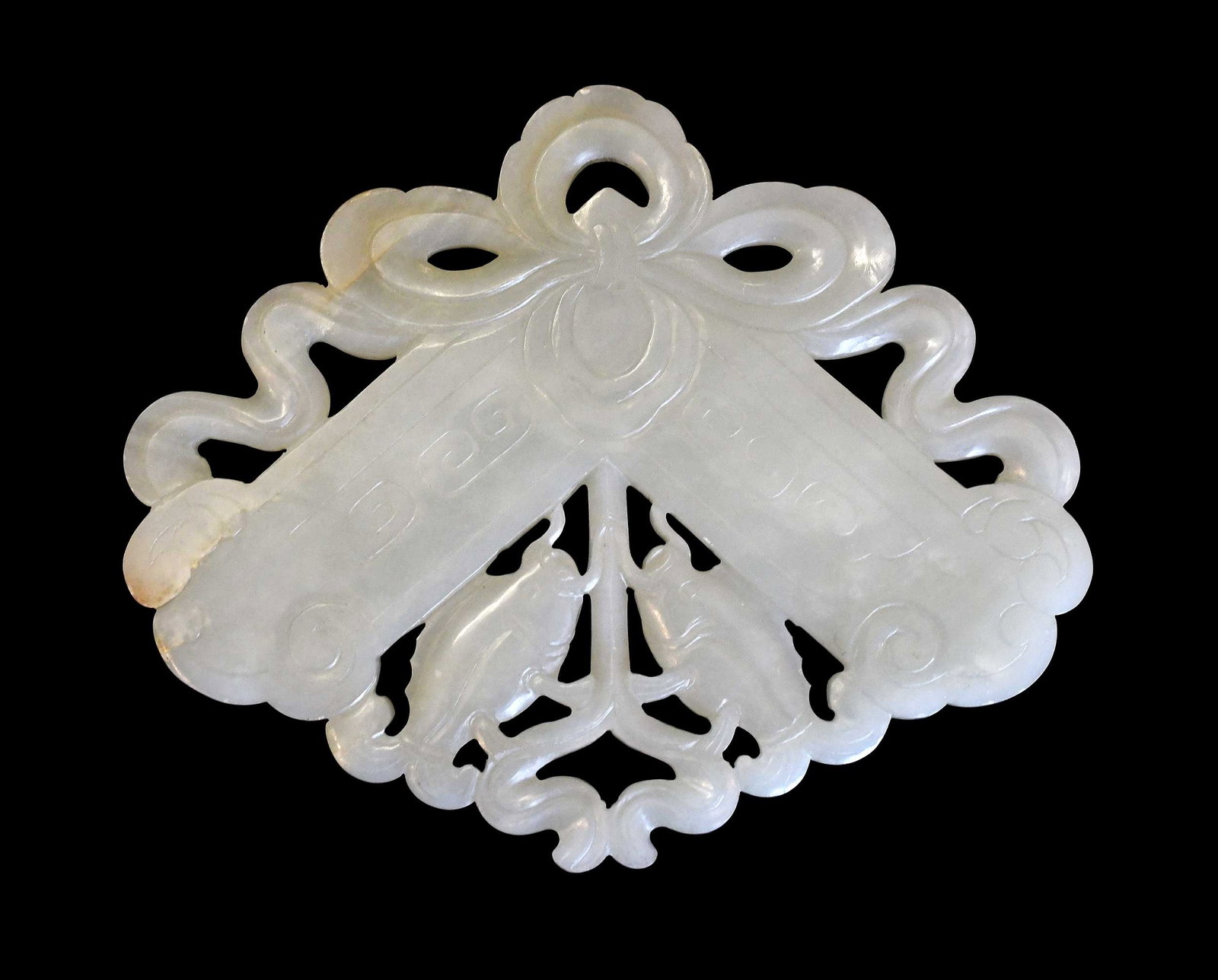 Chinese Carved Jade Auspicious Symbol Plaque: in the form of a chime stone over two koi in pale green jade with russet inclusions, 4-3/8 x 5-3/8 x 1/8 in. Provenance: The Collection of William S. Arnett, Atlanta, Georgia; sold to benefit Tinwood 
