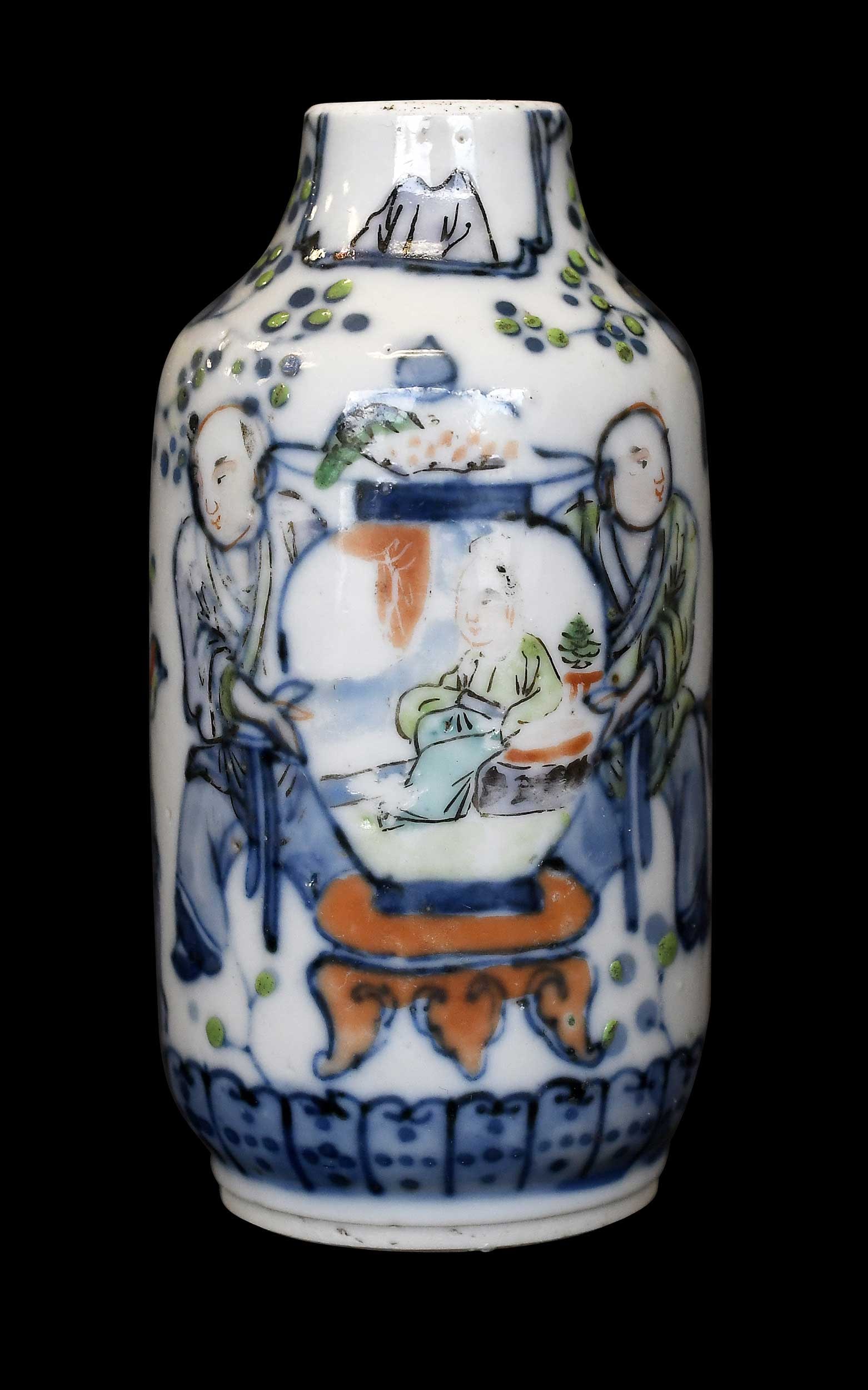 Chinese Underglaze Blue Porcelain Snuff Bottle: with underglaze blue reign mark of the Kangxi emperor, underglaze blue and iron red decoration, green enameling and gilt, 4 x 2 x 2 in. Provenance: Private Collection, Forest City, North Carolina