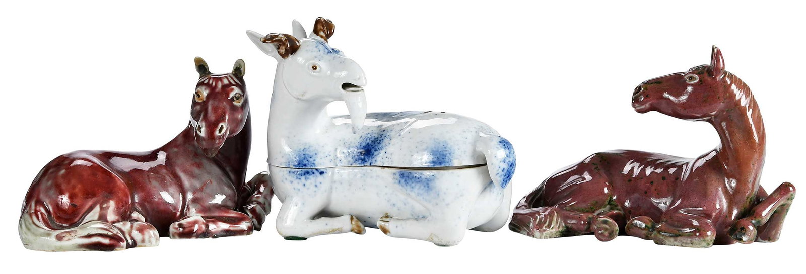Three Chinese Export Reclining Animals: purple glazed horse; red glazed horse; Billy goat box form with white and blue speckled glaze, 6-1/2 x 8-1/2 x 6 in. Provenance: The Collection of Joe Matthews and John Shank, Shepherdstown, West