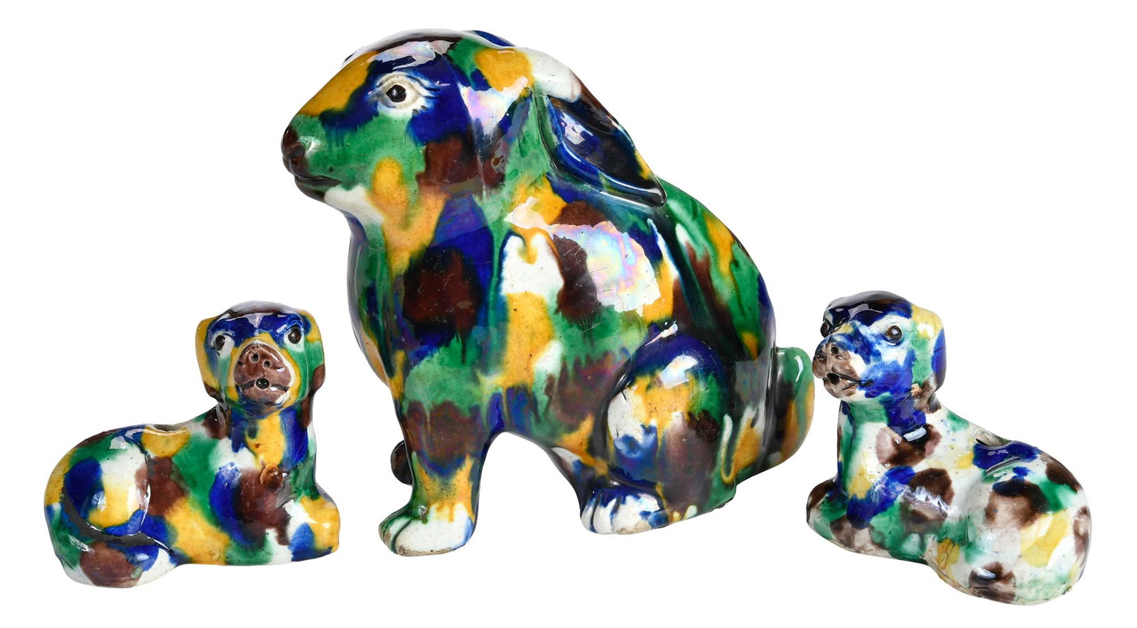 Three Chinese Export Sancai Glazed Animals, Dogs and Rabbit: sitting rabbit, ears back; pair of dog form water droppers, label reads "James Galley, Chinese Export Porcelain, Circa 1835", 6-1/2 x 6 x 3 in. Provenance: The Collection of Joe Matthews and John