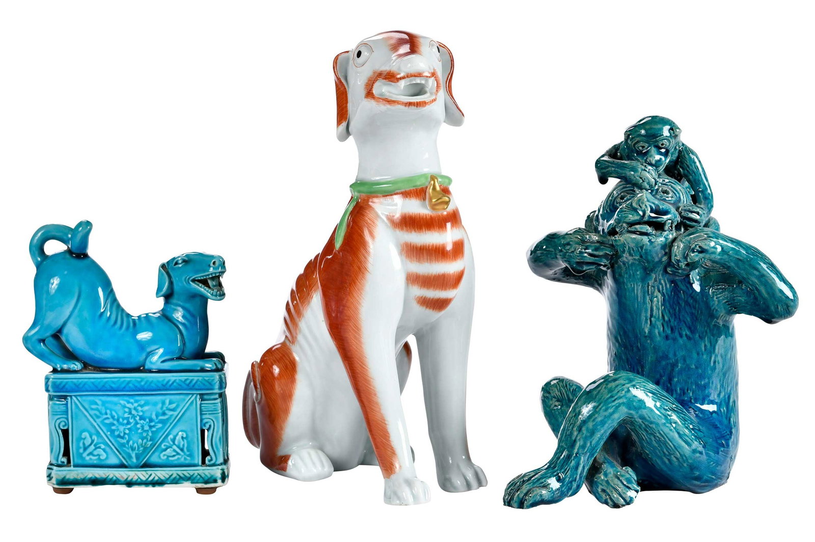 Three Chinese Export Animal Figures: turquoise glazed dog on rectangular plynth; sitting monkey with baby; sitting dog with white glaze and iron red fur accents, 9-1/2 x 8 x 4 in. Provenance: The Collection of Joe Matthews and John