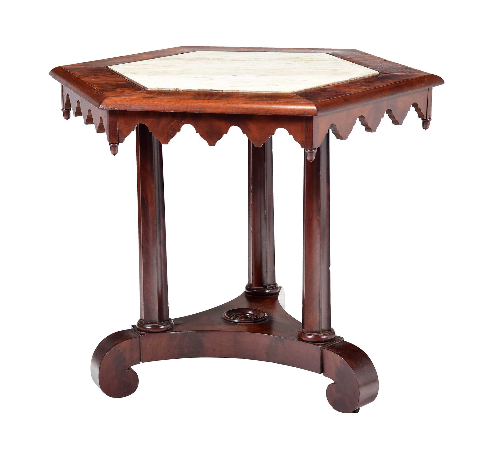 American Gothic Revival Figured Mahogany Hexagonal Maple Top Center Table: probably new York, 19th century, top with inset white marble and bookmatched veneers, faceted column supports, base with bold scrolled feet, 29-3/4 x 35-1/2 x 35-1/2 in. Provenance: The Collection of
