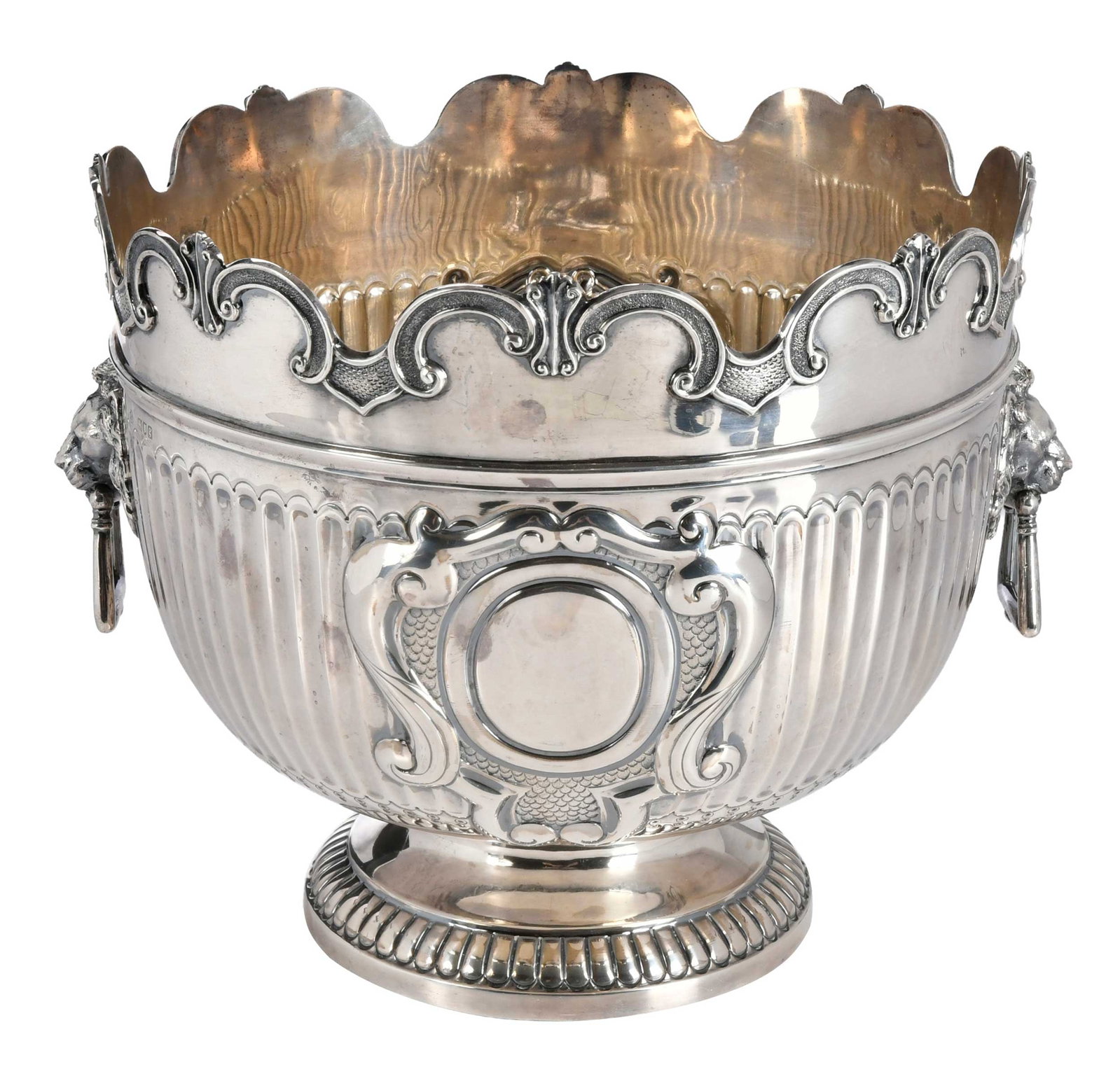 English Silver Monteith, William Hutton & Sons Ltd: London, 1902, scalloped rim, stop-fluted body with molded cartouches and lion head handles, reeded foot, no monogram, marks for William Hutton & Sons Ltd, .925 fine, 81.02 oz. T., 11 x 14-1/2 x