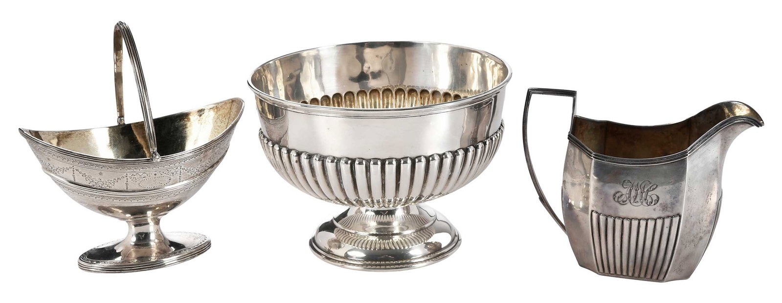 Three English Silver Table Items: including basket form sugar basket, oval with gilt interior, swing handle, marks for Henry Chawner, London, 1787, 6 x 5-1/2 x 3-3/4 in.; creamer, paneled form, gilt interior, marks for London, 1801, p