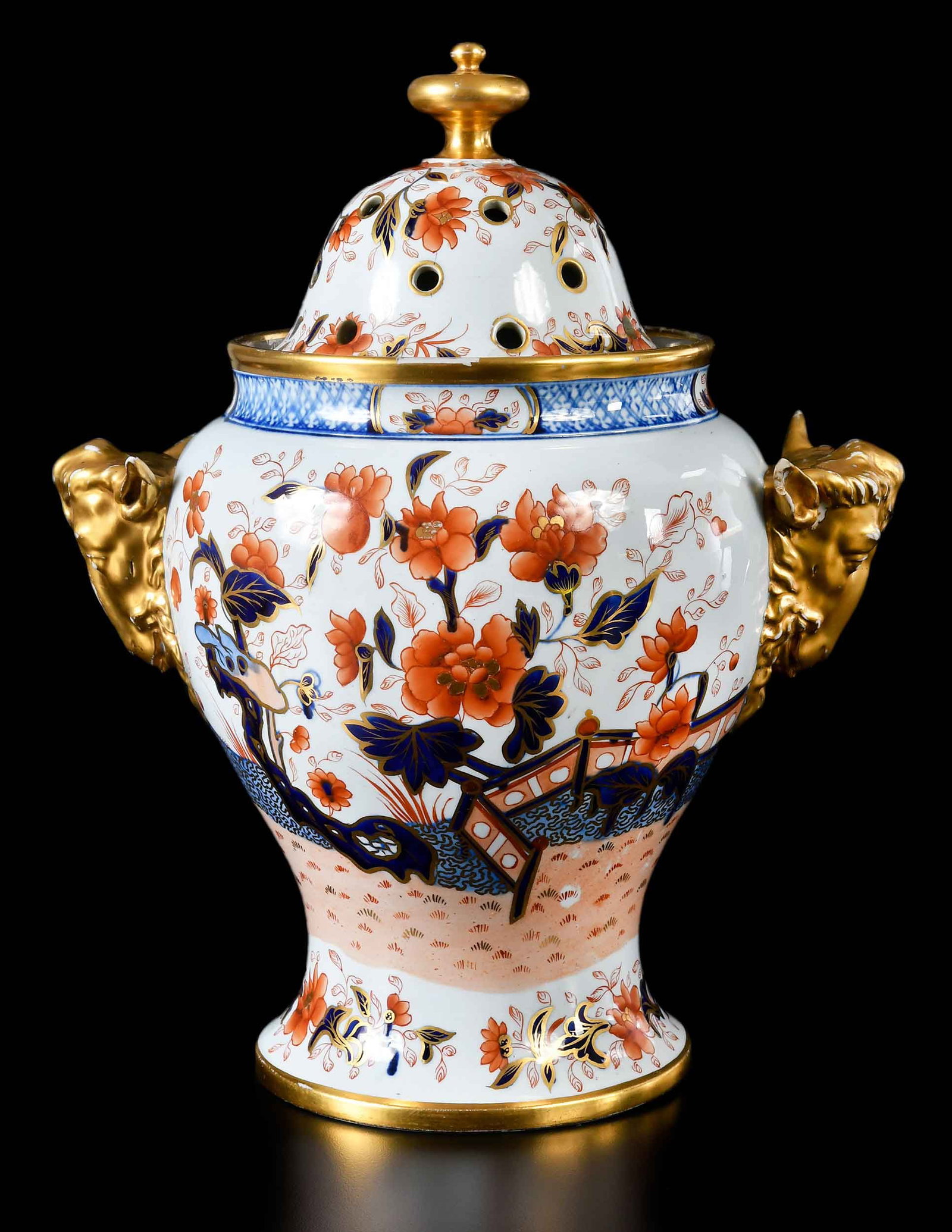 English Imari Porcelain Potpourri Urn: 19th century, unmarked, polychrome and gilt decoration, sheep's head handles, 13-1/4 x 11 x 8 in. Provenance: The Collection of Joe Matthews and John Shank, Shepherdstown, West Virginia