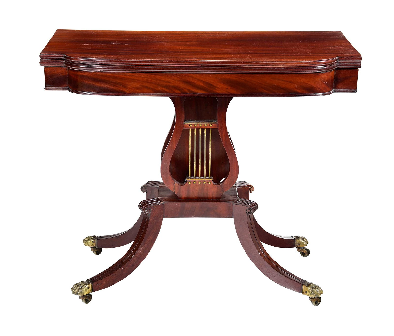 American Classical Figured Mahogany Lyre Base Games Table: probably New York, first half 19th century, rotating astragal flip top, double lyre bass with brass strings, outswept legs with scrolled knees and hairy paw feet on casters, poplar, white pine, and ma