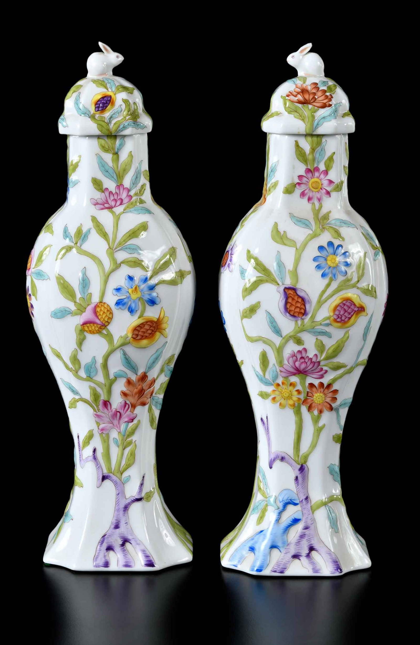 Pair of Herend Porcelain Urns, Rabbit Finials: Hungary, 20th century, raised floral decoration, markings to undersides with "6600/c", 13-1/2 x 3-3/4 x 3-1/2 in. Provenance: The Collection of Joe Matthews and John Shank, Shepherdstown, West