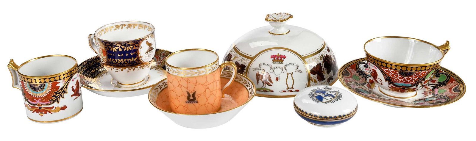 Nine Pieces of Assorted European Armorial Porcelain: comprising: 19th century, Flight Barr & Barr Japan pattern teacup, demitasse cup, and saucer with unknown crest and motto "Spes"; 19th century, Nast Paris demitasse cup and saucer with unknown arms