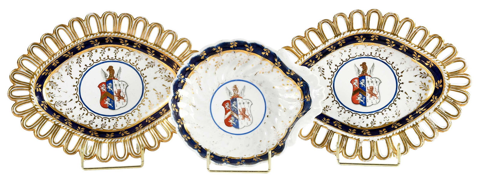 Three English Armorial Porcelain Dishes, Hoskins impaling Moore: probably 19th century, cobalt bands and gilt decoration centering arms of Hoskins impaling Moore, largest 1-3/4 x 11-1/8 x 8-1/2 in. Provenance: The Collection of Joe Matthews and John Shank,
