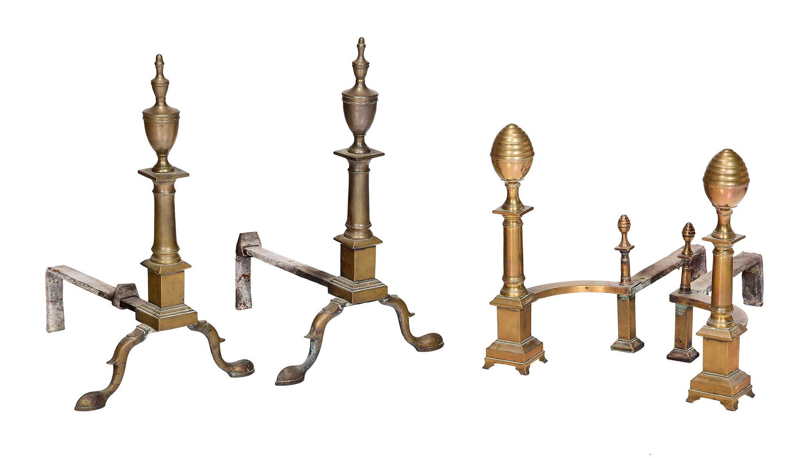 Two 19th Century Pairs of Brass and Iron Andirons: comprising Federal pair with urn finials, spurred slipper feet, 21-3/4 x 15-1/4 x 13-1/4 in.; Classical pair with beehive finials, bracket feet, 16-1/4 x 20 x 7-1/2 in. Provenance: The Collection of