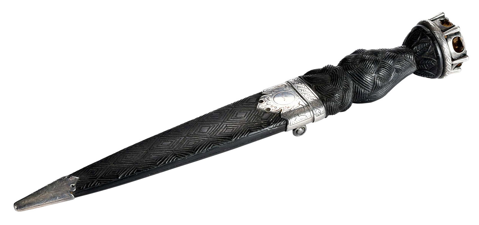 Late Victorian Silver Mounted Scottish Sgian Dubh Ceremonial Knife: late 19th century, bogwood hilt and sheath, .925 silver mounts with marks for Edinburgh, 1893, smoky quartz mounted to pommel, 11-3/8 x 1-1/2 x 1-3/8 in. Provenance: The Collection of Joe Matthews and
