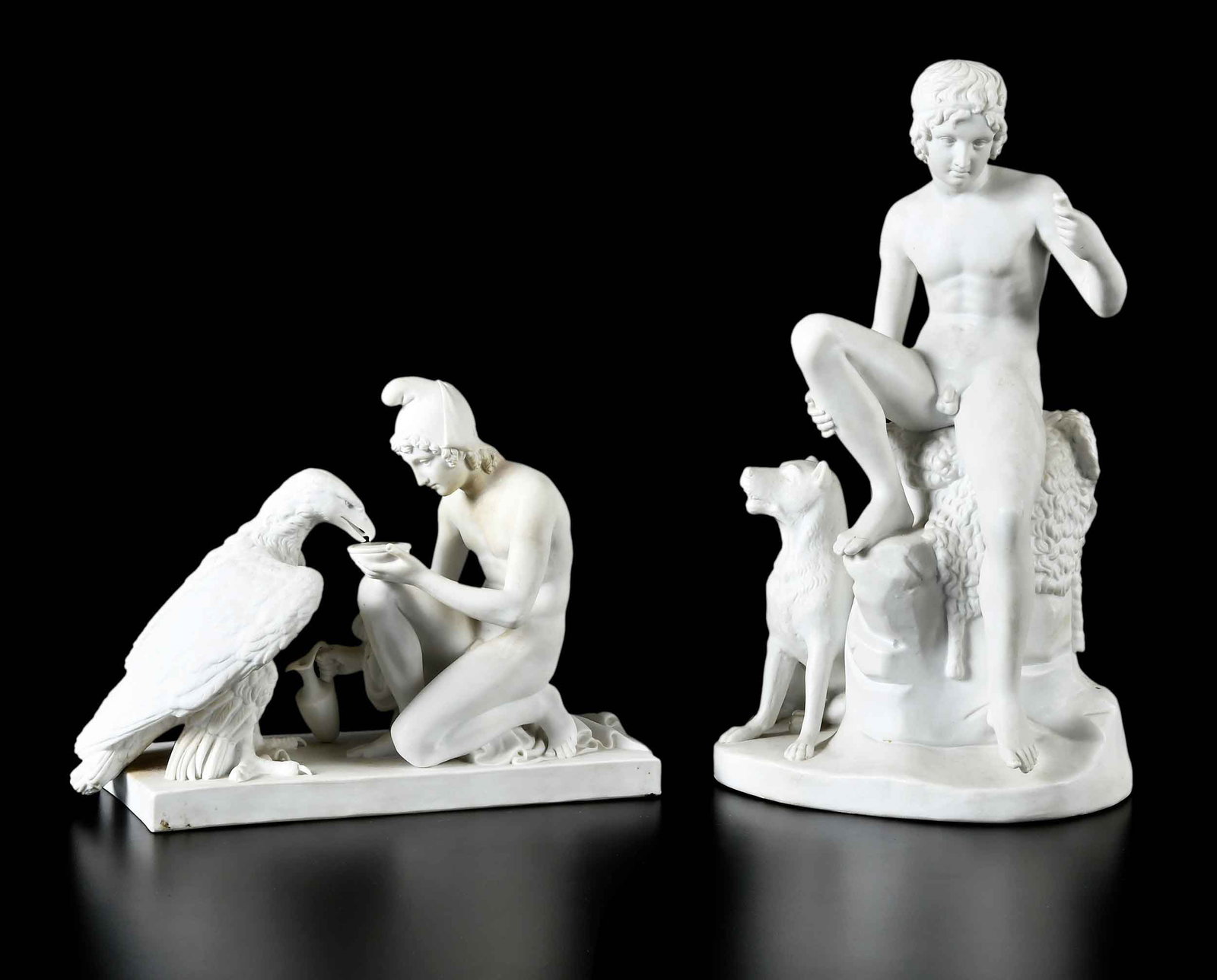 Two Bisque Porcelain Figural Groups: Danish, late 19th century, each stamped "B&G / Eneret" on bases (for Bing & Grondahl), Ganymede and Zeus as an Eagle; Seated Boy with a Dog; larger 13-1/4 x 7-1/4 x 5-1/2 in. Provenance: The