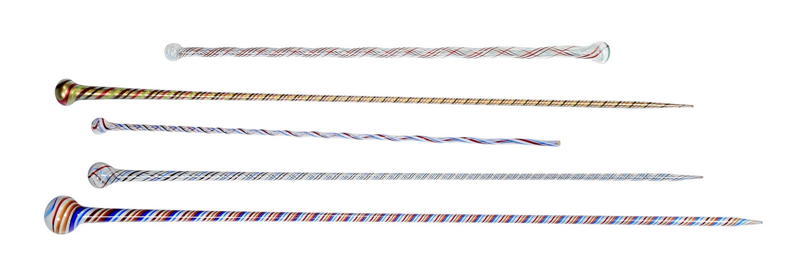 Five Large Striped Blown Glass Walking Sticks/Parade Staves: late 19th/early 20th century, all with bulbous terminals, multicolored swirled stripe decoration, one double ended example, largest 62 x 3-1/4 x 3-1/4 in. Provenance: The Collection of Joe Matthews