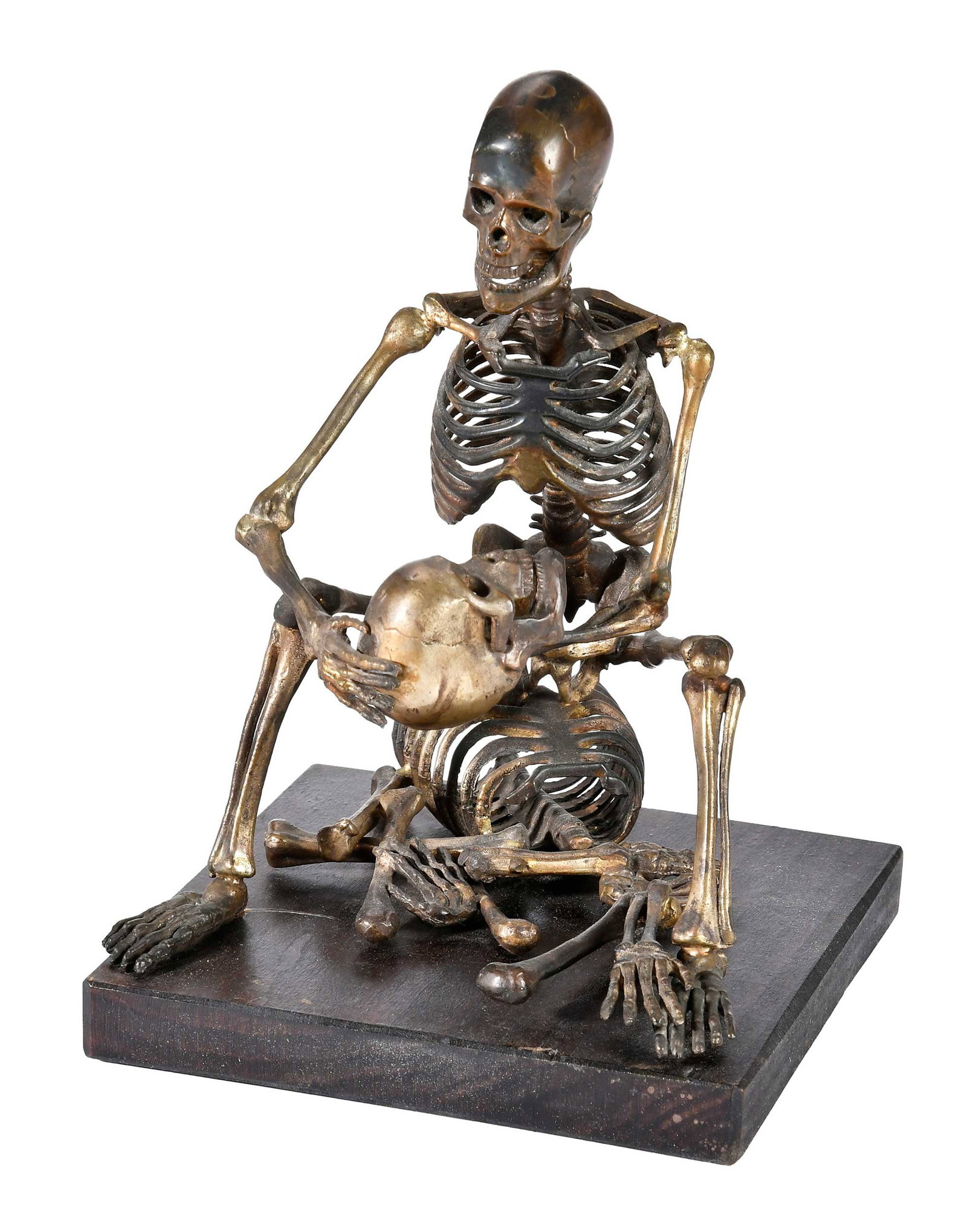 David W. Dempsey, Skeleton Bronze: (American, 20th/21st century) Vanitas, contemplating a skull, signed on proper right hip "DWD", patinated bronze on wood base, overall 8-1/2 x 6 x 6-1/4 in. Provenance: The Collection of Joe Matthews 