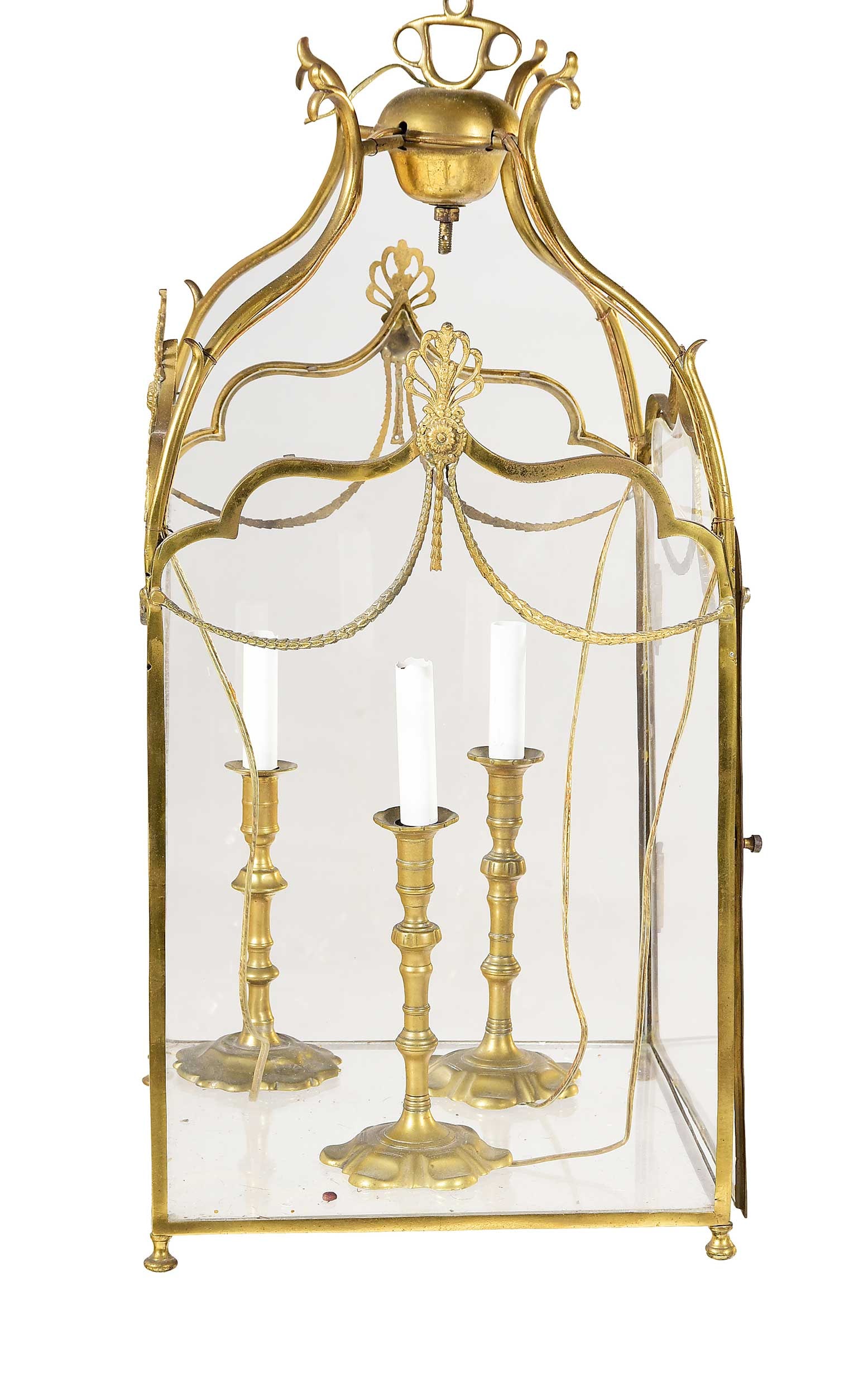 Regency Style Brass and Glass Three Light Hanging Lantern: 20th century, three candlestick form lights, hinged door, 28-1/2 x 13 x 13 in. Provenance: The Collection of Joe Matthews and John Shank, Shepherdstown, West Virginia