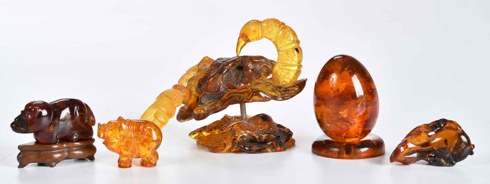 Five Carved Amber Figural Table Objects - 2
