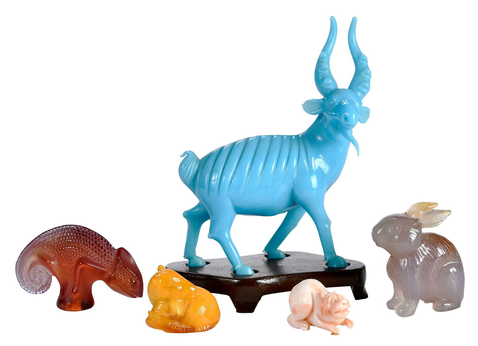 Five Animal Figural Table Objects, One Lalique: 20th century, comprising: crystal chameleon marked "Lalique France"; glass antelope with wood stand; carved rabbit, carved rat; carved quadruped; largest 5-1/2 x 4-1/4 x 2-1/8 in. Provenance: The Coll