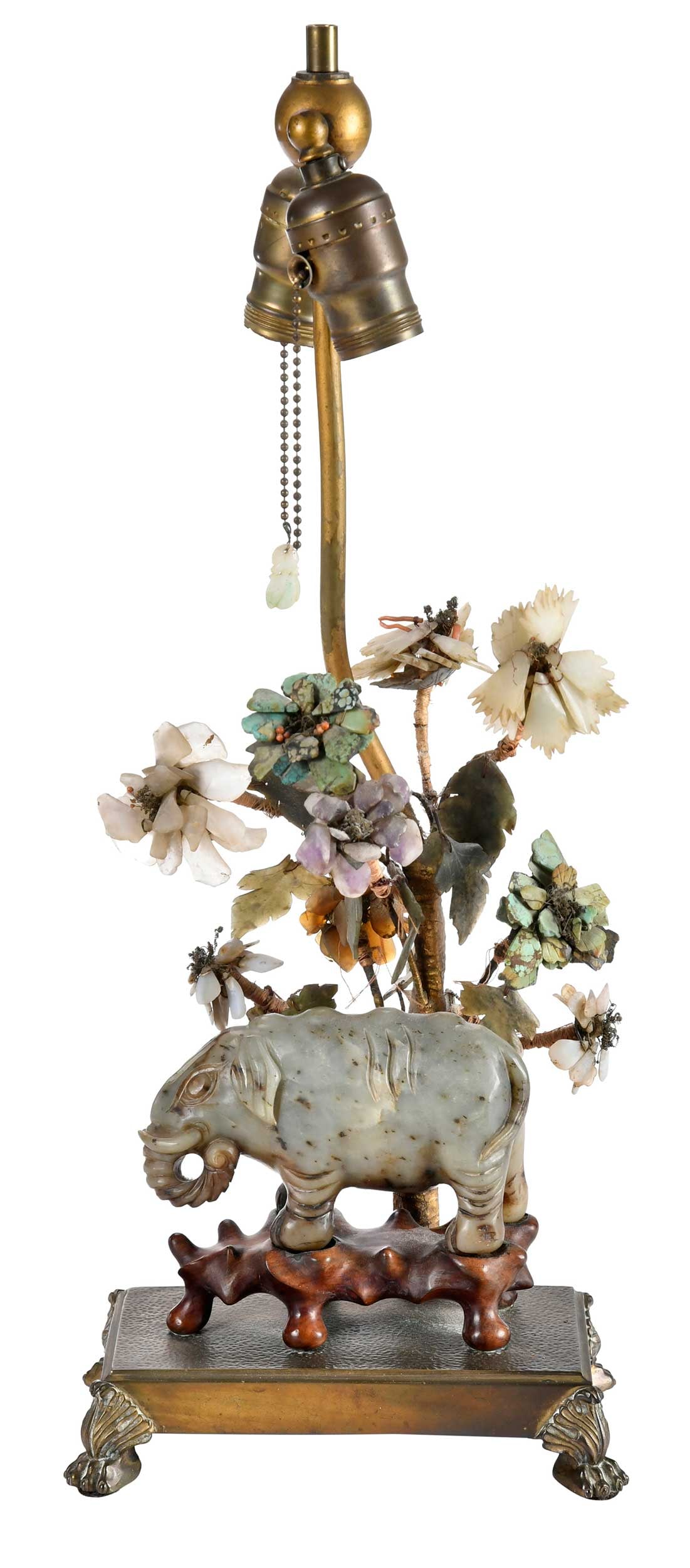 Chinese Carved Jade Elephant and Hardstone Tree as Lamp: 20th century, 21 x 8 x 5 in. Provenance: The Collection of Joe Matthews and John Shank, Shepherdstown, West Virginia Note: The elephant tested as nephrite on the Presidium Gem Tester II.