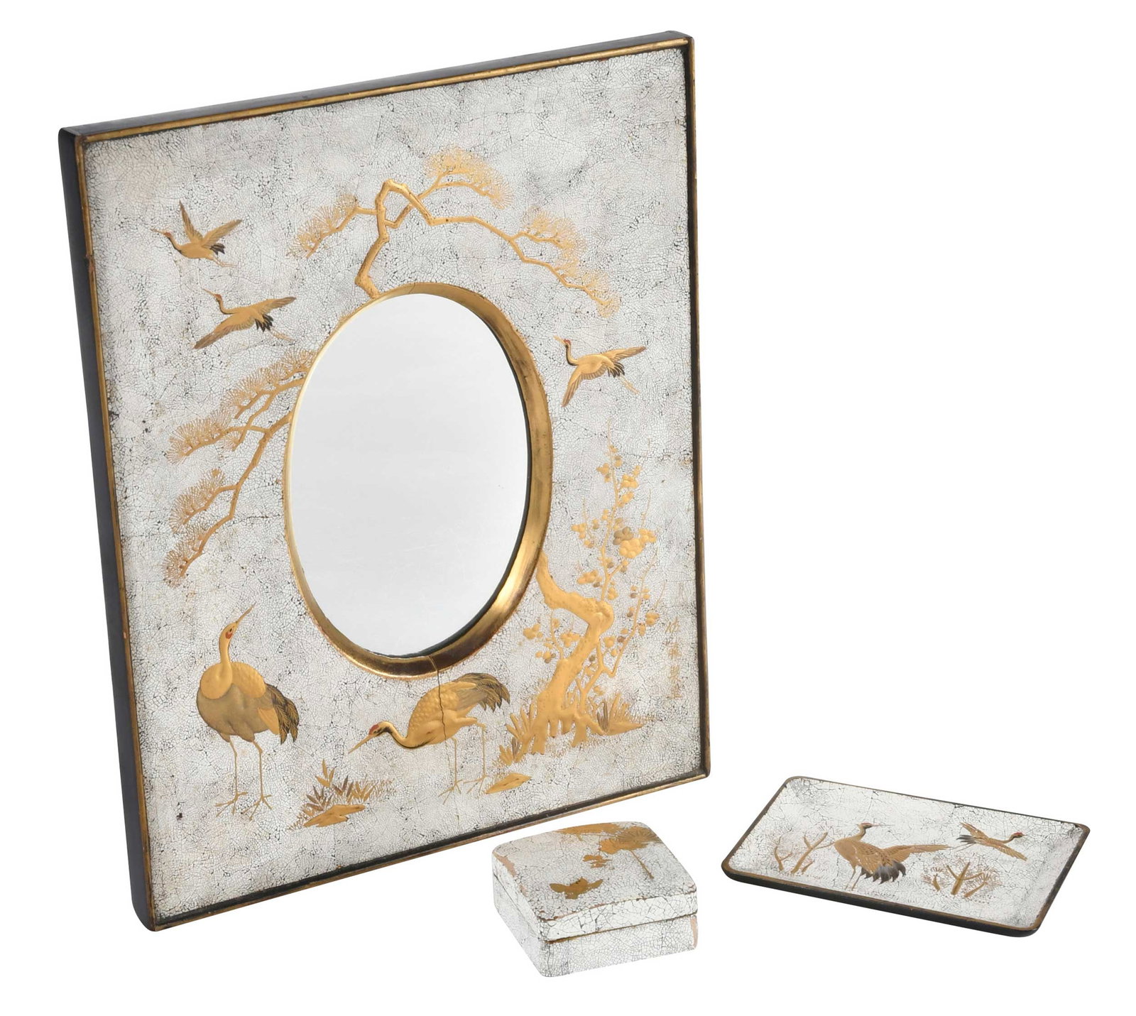 Three Piece Japanese Gilt Lacquer Vanity Set: crane motif, including mirror, tray, and lidded box, lidded box with gilt signature to underside, largest 11-7/8 x 9-5/8 x 3/4 in. Provenance: The Collection of Joe Matthews and John Shank,