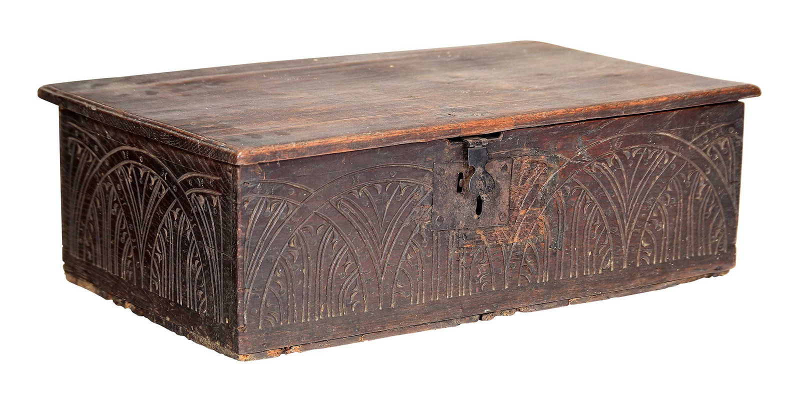 English Carved Oak Bible Box: 17th/18th century, engraved decoration to exterior, remnant of floral printed lining at interior lid, 8-1/2 x 26-3/4 x 16-1/2 in. Provenance: The Collection of William S. Arnett, Atlanta, Georgia; sol