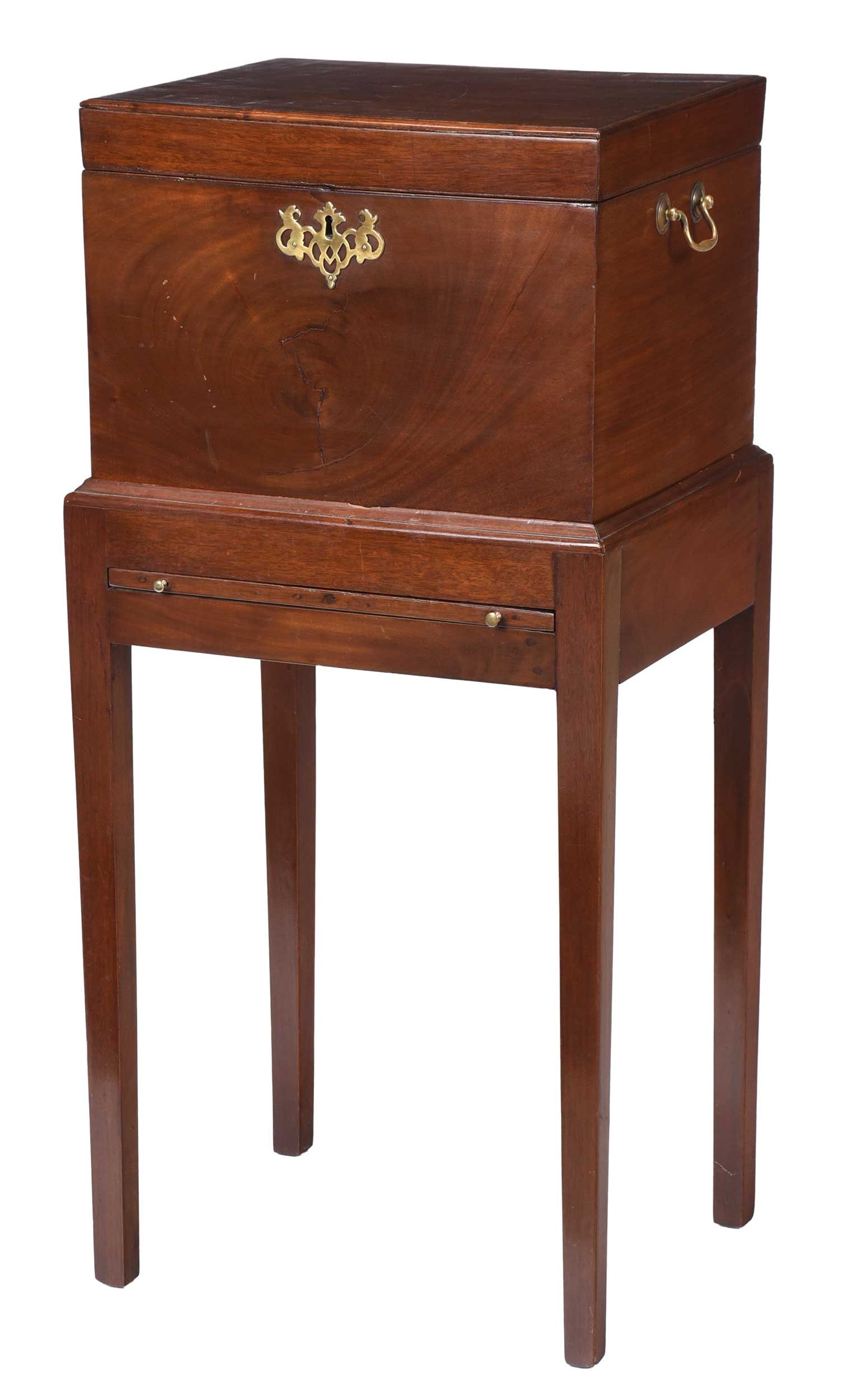 Regency Mahogany Cellarette with Plum Pudding Figuring: British or American, early 19th century, plum pudding figuring to hinged top, opening to a divided interior, brass bail handles, lower stand with drink slide and tapered legs, mixed secondaries with p