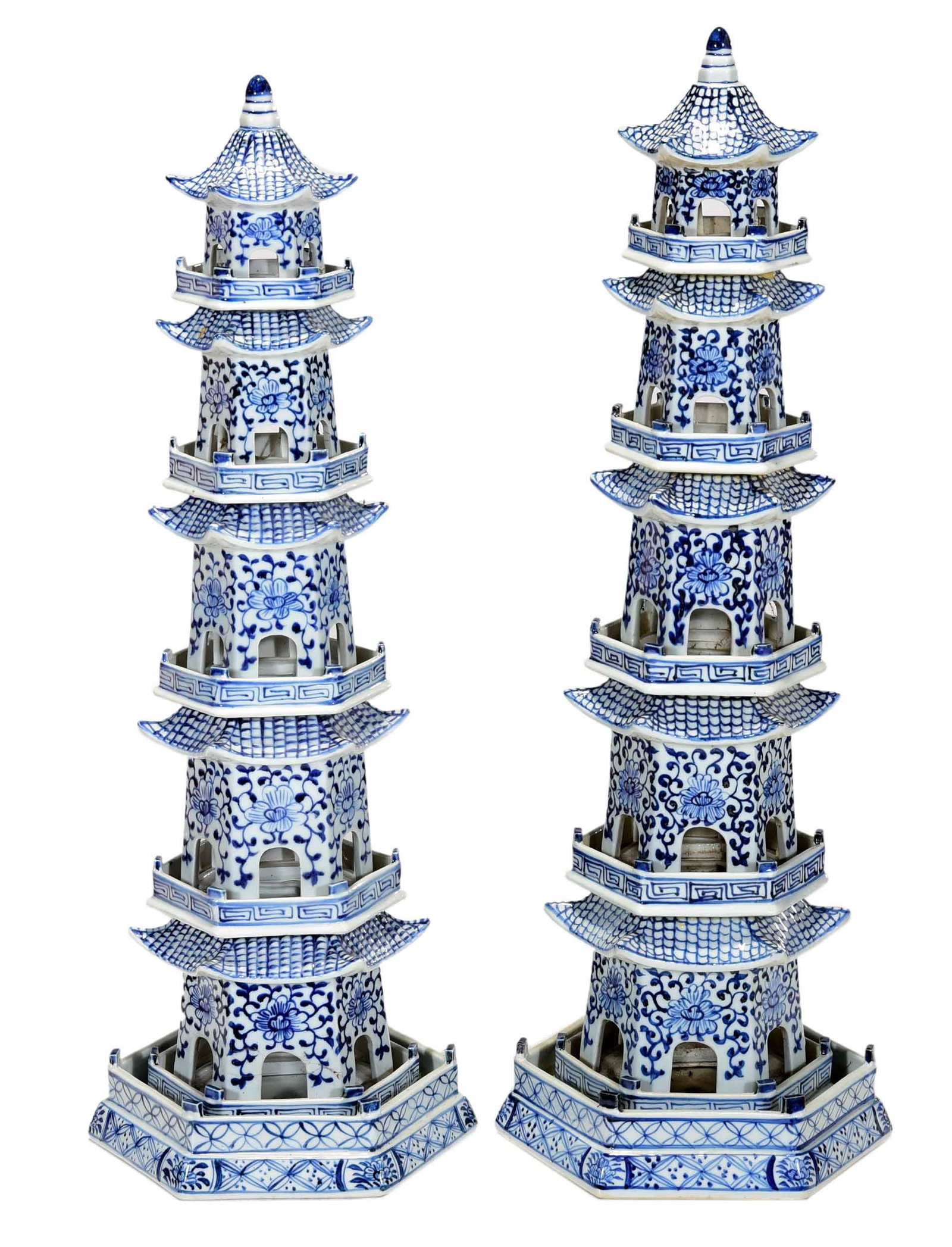 Pair of Chinese Blue and White Porcelain Pagoda Tulipieres: 20th century, underglaze blue floral decoration, 28-5/8 x 10-1/2 x 9-1/2 in. Provenance: Collection of Steve Stewart, Lake Lure, North Carolina