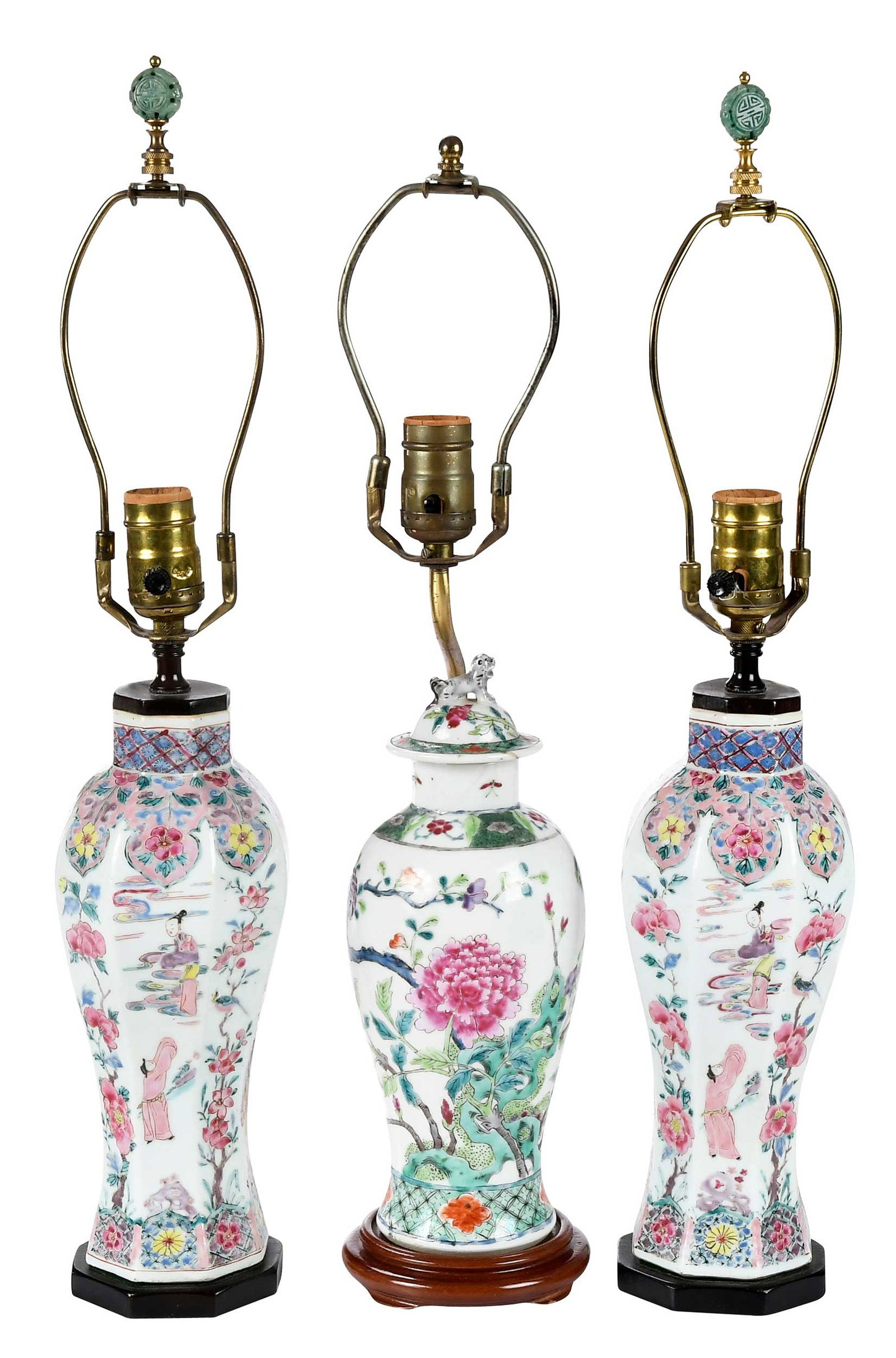 Three Chinese Export Famille Rose Porcelain Vases Converted to Lamps, One Pair: 18th/19th century, wood bases, with harps, lidded vase with foo dog finial, harps of baluster pair with carved jade finials, larger pair 14-7/8 x 5 x in. (to top of sockets) Provenance: Private Florid