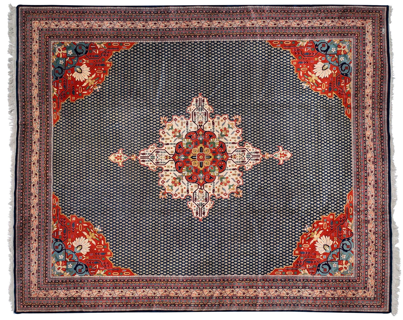 Large Mir Type Carpet: 20th century, central medallion on boteh populated blue field, red spandrels, multi tiered border, 15 ft. x 12 ft. 1 in. 