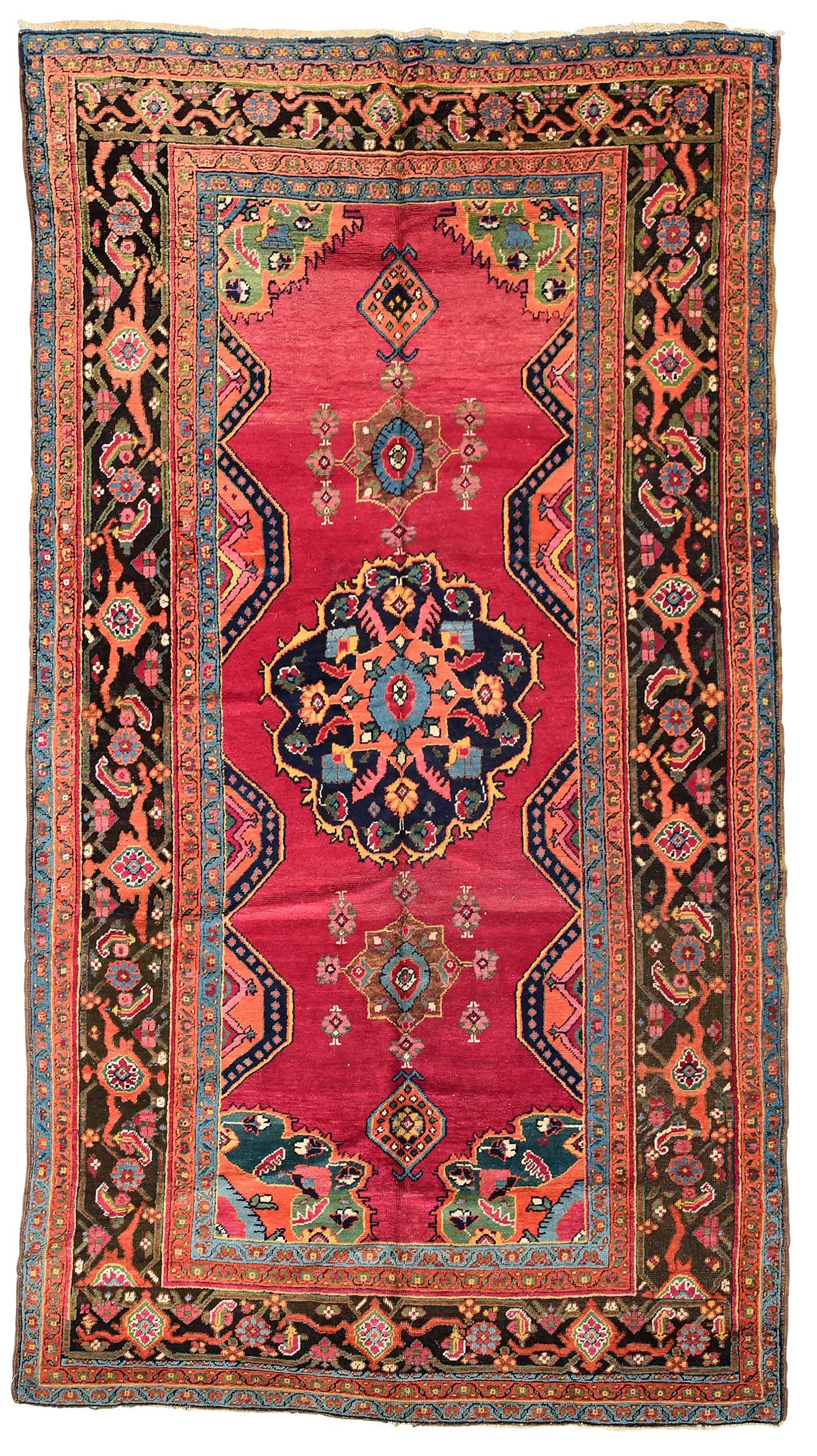 Karabaugh Rug: first half 20th century, central medallion on red ground, with blue border, 9 ft. 2 in.5 ft. 1 in. 