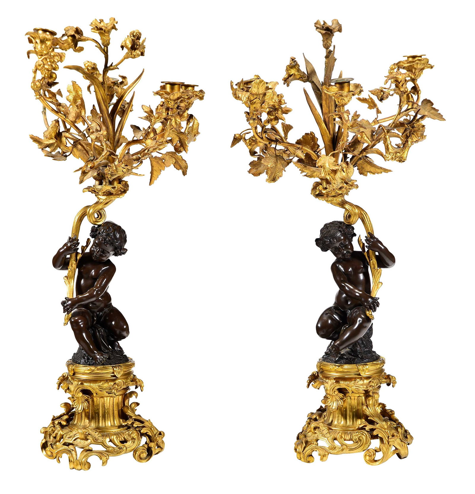 Pair of Monumental Louis XV Style Figural Putti Gilt Bronze Five-Light Candelabra: probably French, late 19th century, apparently unsigned, each approx. 32-1/2 x 15-3/4 x 16-1/2 in. Provenance: Private Charlotte Collection