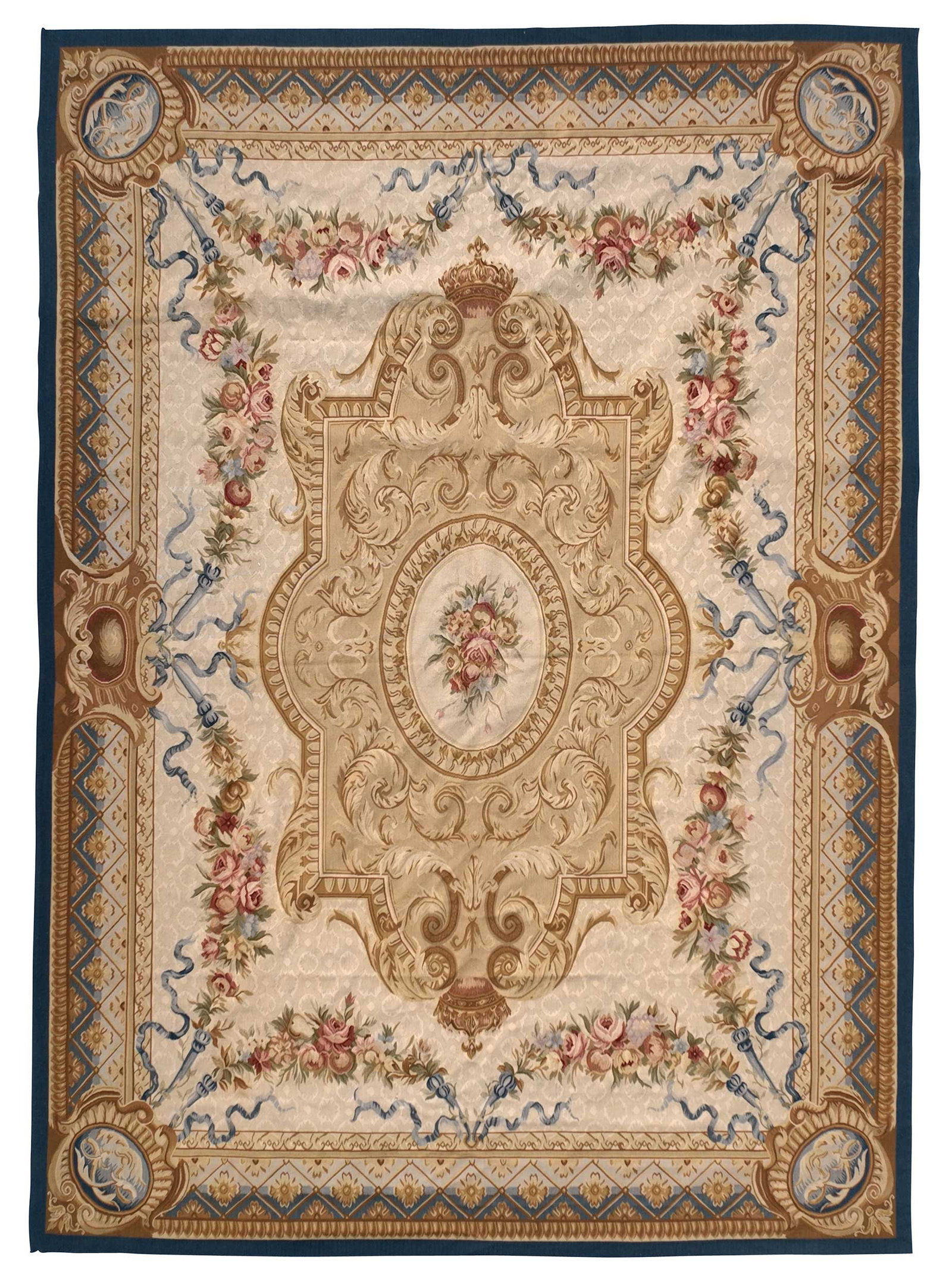 Aubusson Style Tapestry Carpet: 20th century, architectural and floral motif on beige ground, blue border, 12 ft. 3 in. x 8 ft. 9 in. Provenance: Private Charlotte Collection