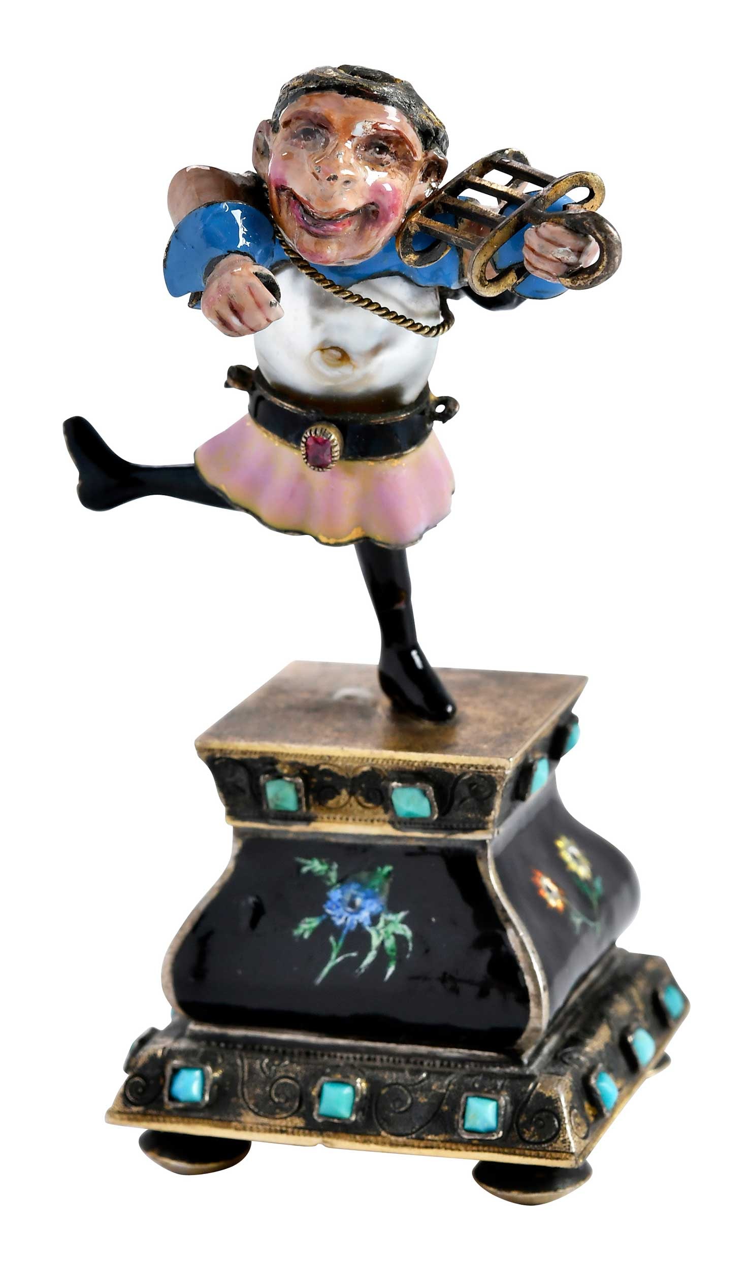 Viennese Gilt Metal Enamel Drunken Musician: late 19th century, figure on one foot trying to play a grill like a violin, on enamel plinth, freshwater pearl torso, turquoise and ruby accents, 3-1/4 in. Provenance: Hannam's Auctioneers Ltd,