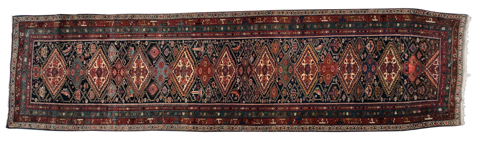 Kurdish Bidjar Runner: mid 20th century, row of diamond medallions on dark blue ground, 14 ft. 9 in. x 4 ft. 