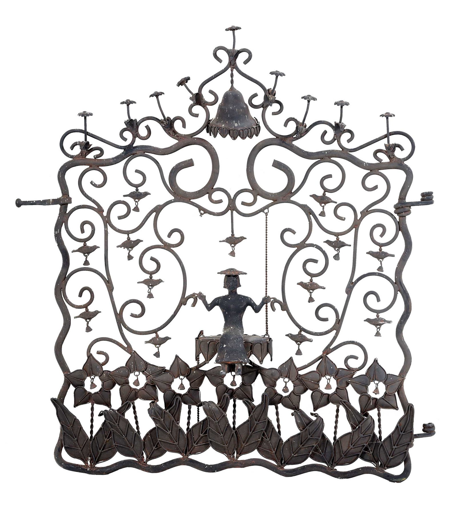 Whimsical Wrought Iron Figural Gate with Bells: 20th century, black painted scrollwork with birds and flowers mounted with bells centering woman on swing, 46-3/4 x 43 x 6 in. Provenance: Collection of Steve Stewart, Lake Lure, North Carolina