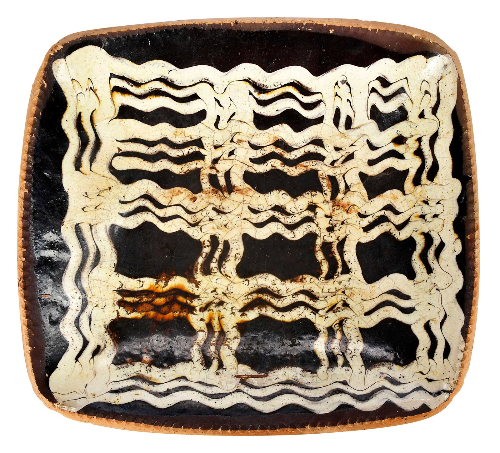 English Rectangular Slipware Dish: 18th/19th century, dark brown ground with cream slip decoration, light clay body stamped "12" to underside, 3-1/2 x 15-1/2 x 14-1/4 in. Provenance: Private Collection