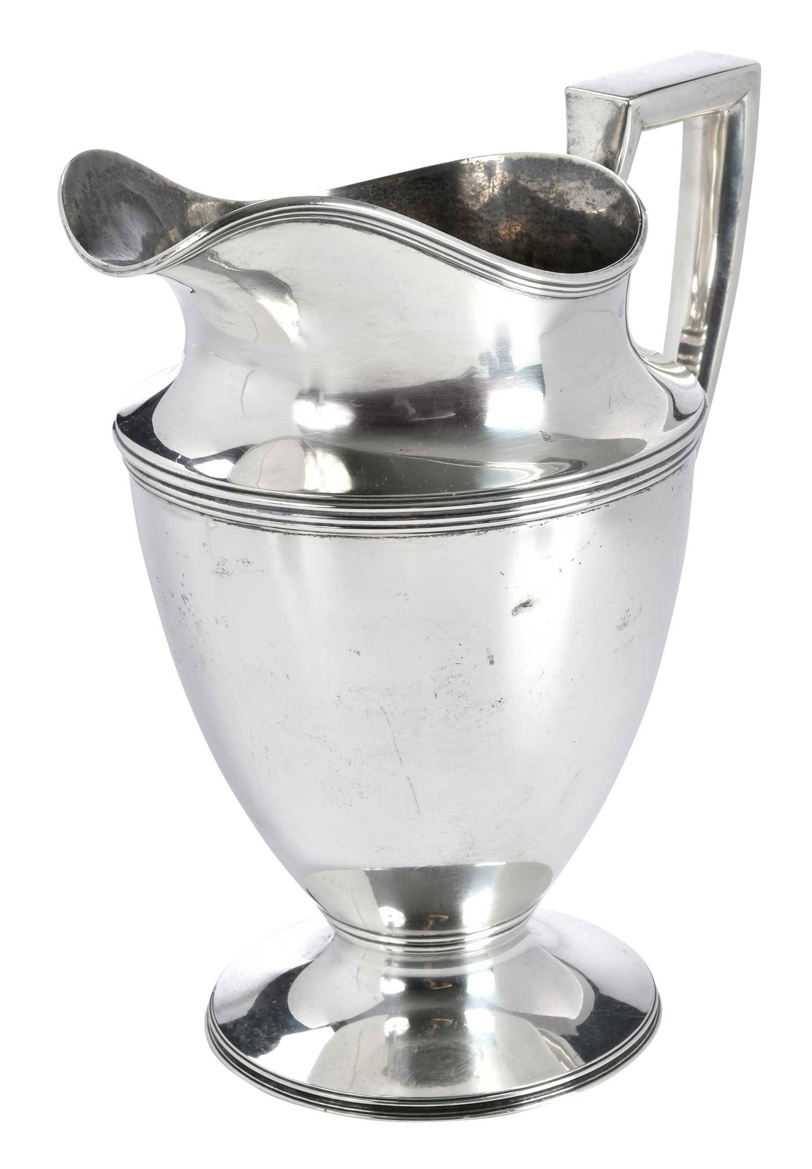Tiffany Sterling Water Pitcher: American, 1907-1947, helmet form, no monogram, marks for Tiffany & Co., "18181...7728", 34.85 oz. T., 9-1/4 in. Provenance: Private Collection